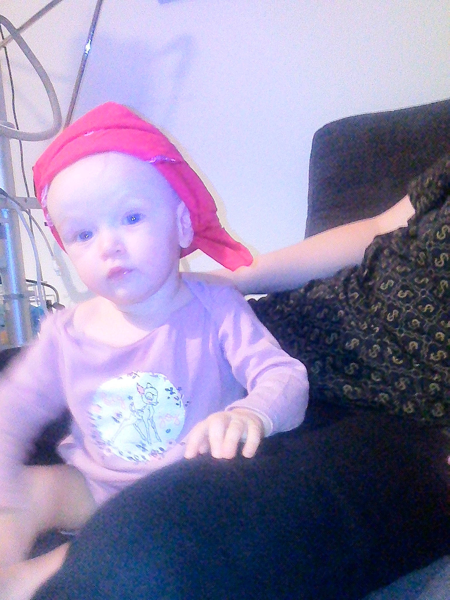 Amaya participe au concours pour gagner de l'argent avec cette photo : baby, baby_toddler_clothing, cap, comfort, electric_blue, eye, fun, hat, head, headgear, headwear, lap, magenta, pattern, person, purple, room, sitting, sleeve, t_shirt