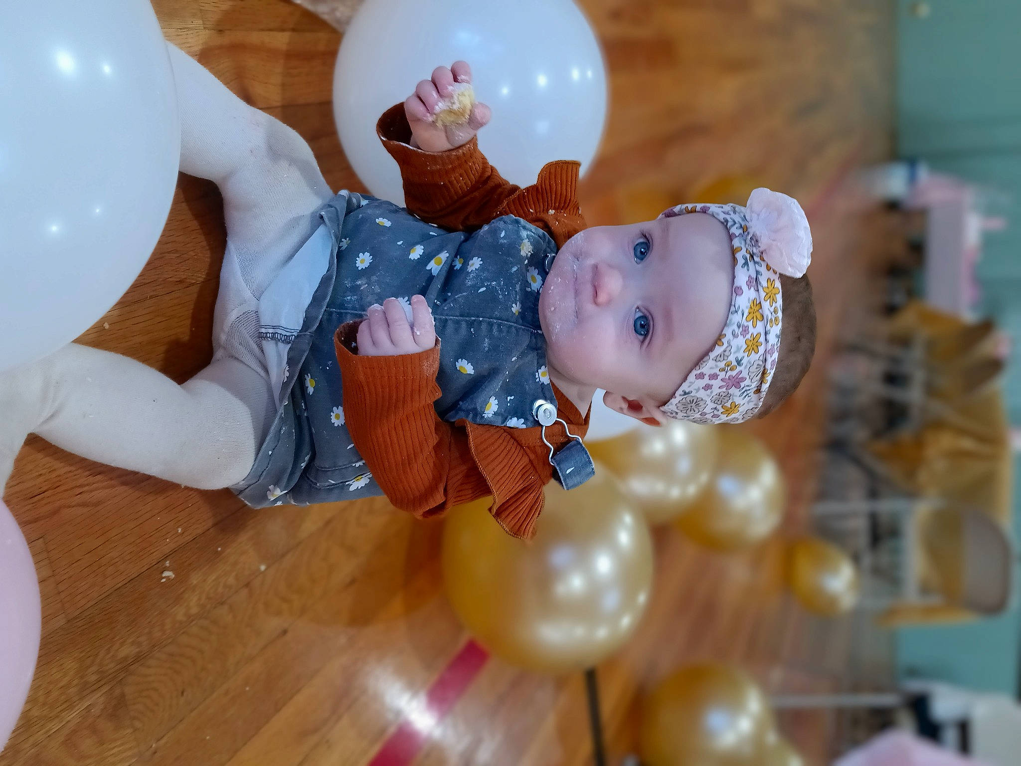 Sayla joined the competition — help win amazing prizes! baby, baby_toddler_clothing, balloon, child, event, flooring, fun, happy, hardwood, hat, headwear, party_supply, person, room, smile, sock, toddler, toy, varnish, white