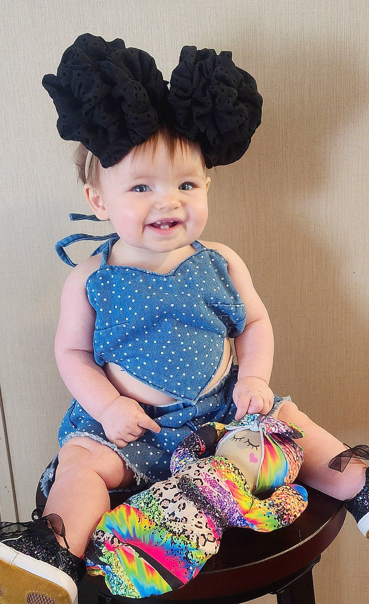 Halen is registered to the contest to win money with this photo: baby_toddler_clothing, beauty, blue, dress, electric_blue, face, happy, hat, joy, neck, outerwear, pattern, person, pink, product, purple, skin, sleeve, smile, textile