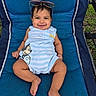 baby, child, smiling, sunglasses, outdoor, blue_chair, mickey_mouse, striped_clothing, happy, cute, infant, relaxing, grass, legs, feet, person, portrait, summer, casual, playful