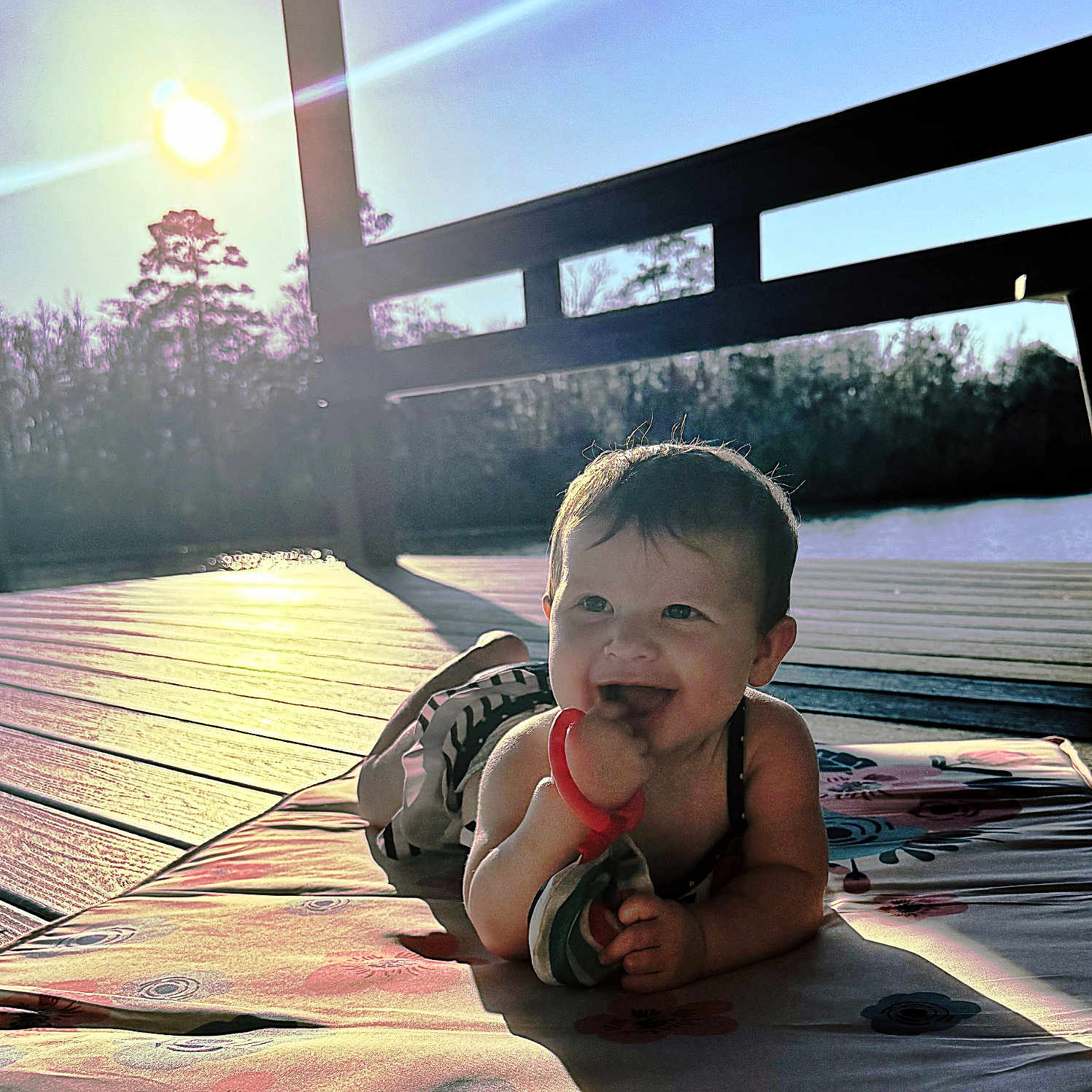 Estoria joined the competition — help win amazing prizes! baby, child, cute, daylight, deck, happy, infant, mat, nature, outdoor, person, playful, portrait, relaxing, shadow, smiling, summer, sun, sunlight, wood