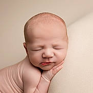 Elijah is registered to the contest to win money with this photo: newborn, baby, sleeping, infant, face, skin, hands, cushion, resting, peaceful, portrait, closeup, soft_lighting, wrinkles, head, fingers, skin_tone, indoors, calm, cute
