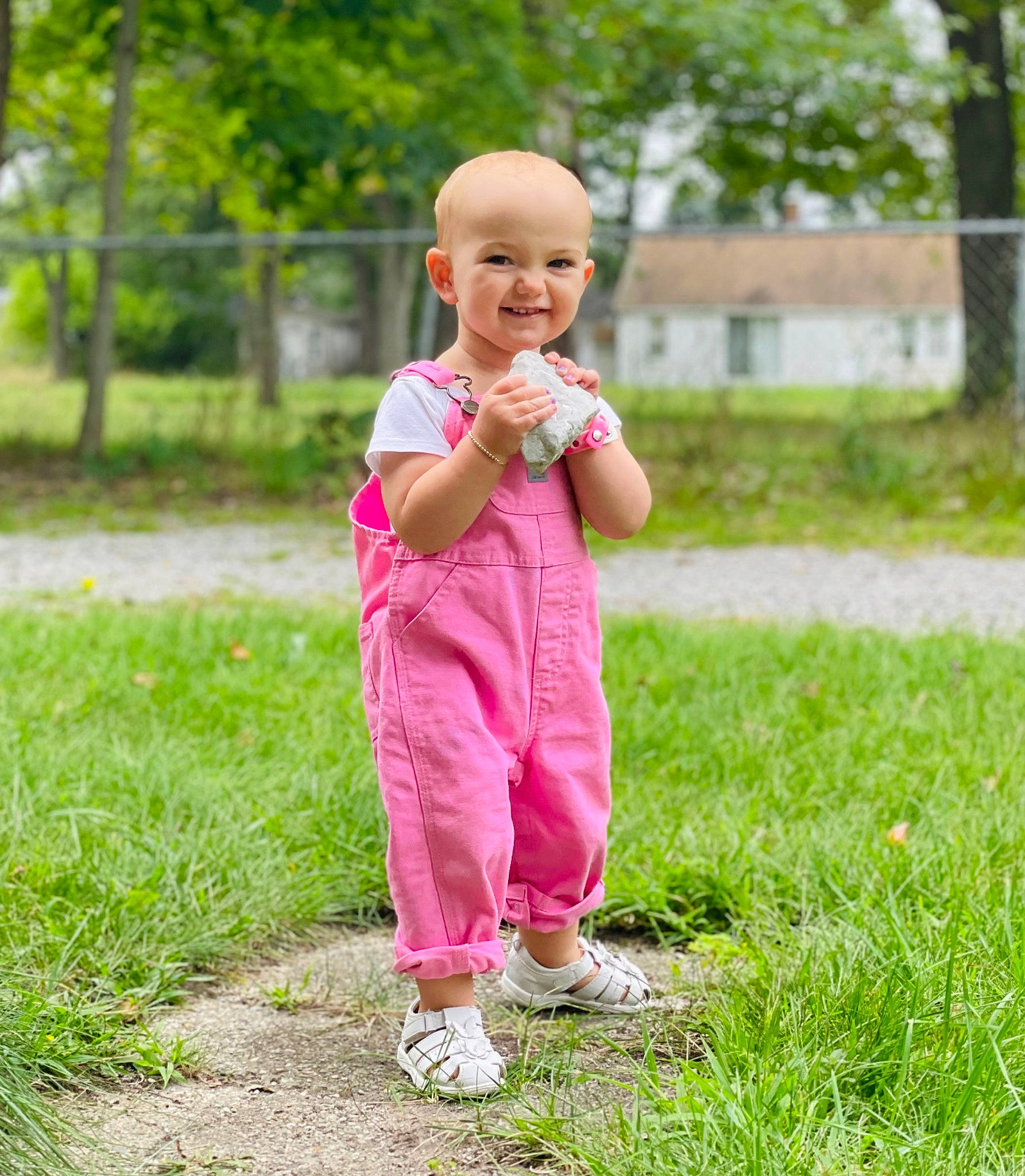Ophelia is registered to the contest to win money with this photo: baby, baby_toddler_clothing, ball, grass, grass_family, grassland, hand, happy, head, joy, lawn, leisure, meadow, outerwear, people_in_nature, person, plant, recreation, smile, sneakers