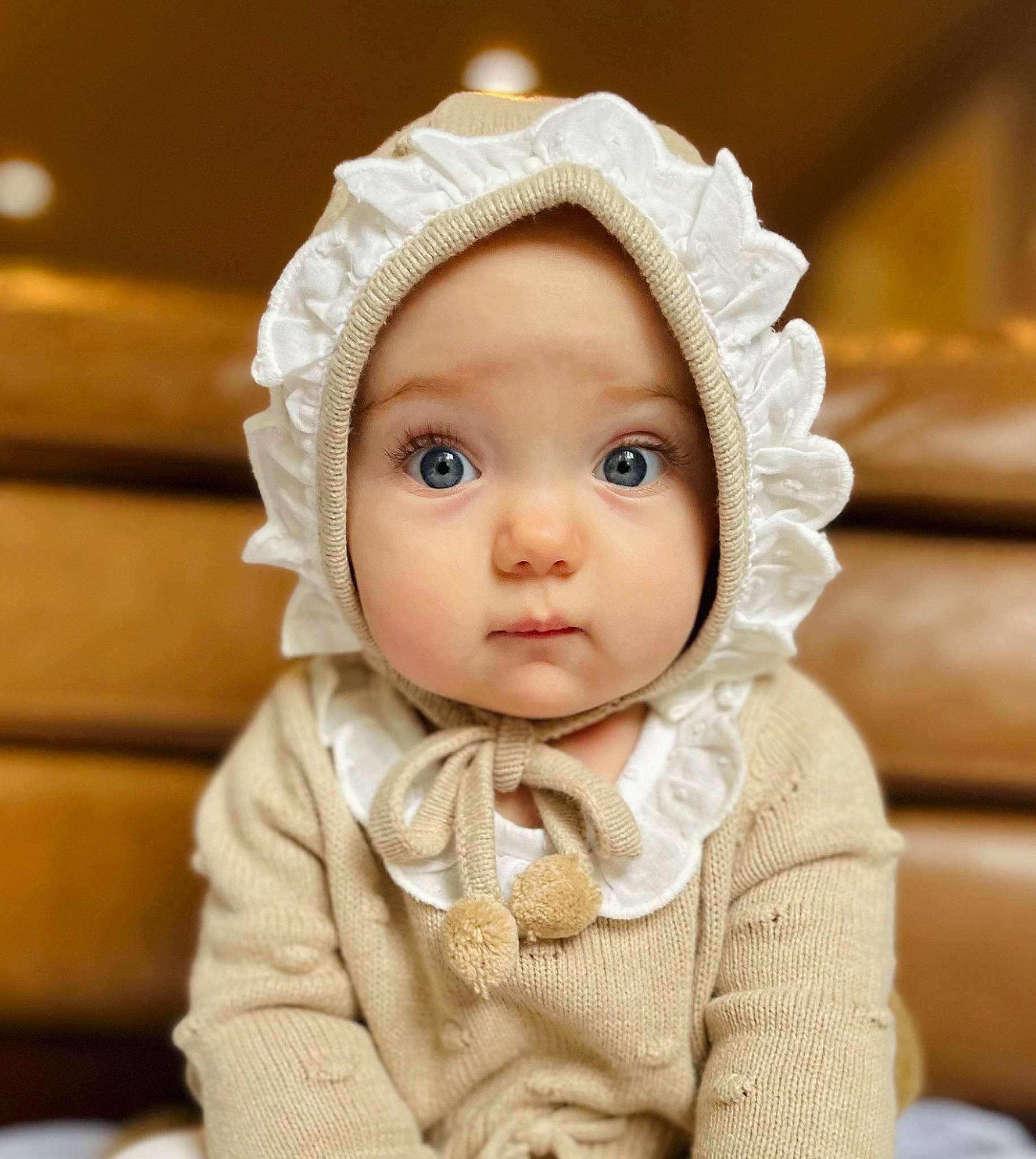 Ophelia is registered to the contest to win money with this photo: baby, baby_toddler_clothing, cap, cheek, chin, collar, eye, eyelash, face, flash_photography, happy, head, headgear, headwear, human_body, iris, lip, nose, person, skin