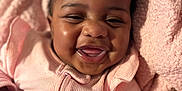 Jhayde joined the competition — help win amazing prizes! baby, blanket, child, closeup, cozy, cute, face, hand, happy, indoors, infant, joyful, pacifier_clip, pink_clothing, portrait, skin, smile, soft_texture, toddler, warm