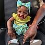 Jhayde is registered to the contest to win money with this photo: baby, blue_clothing, car_seat, child, cute, footwear, hand, happy, headband, human, indoor, infant, person, playful, portrait, sandals, sitting, skin, smiling, yellow_clothing