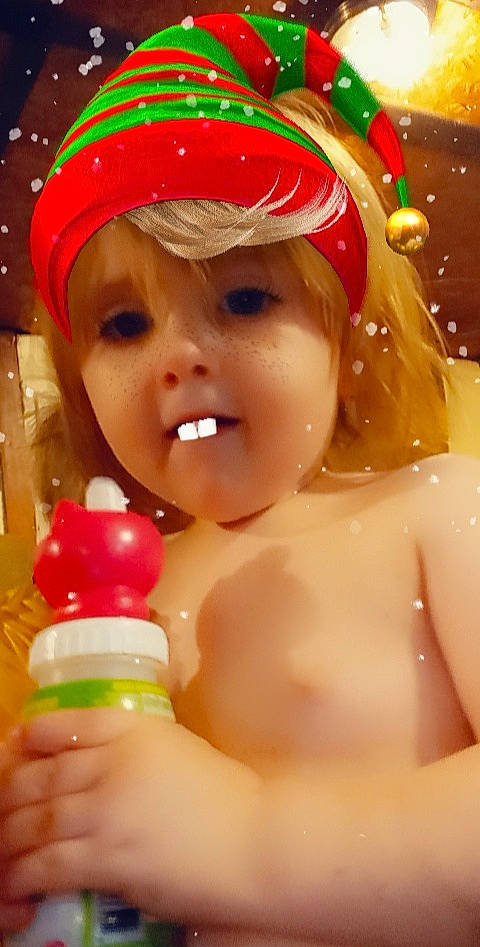 Layla joined the competition — help win amazing prizes! baby, baby_playing_with_toys, bathing, cap, cheek, chest, child, event, facial_expression, fun, happy, headwear, lip, nail, organ, party_supply, person, plastic_bottle, skin, sweetness