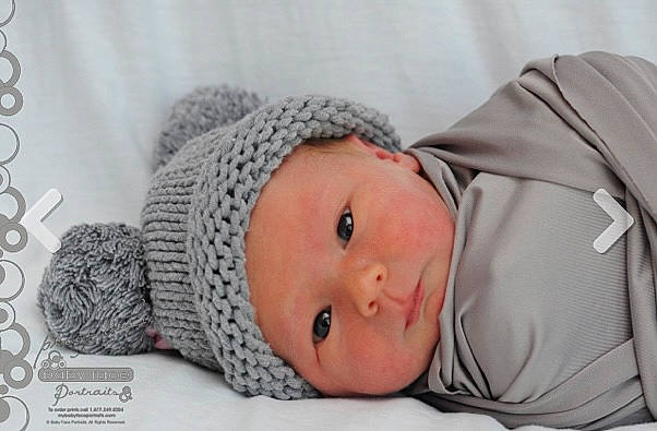 Roy is registered to the contest to win money with this photo: baby, baby_products, baby_safety, baby_sleeping, baby_toddler_clothing, beanie, cap, cheek, child, comfort, fur, hat, headwear, knit_cap, linens, person, room, skin, sleeve, toddler