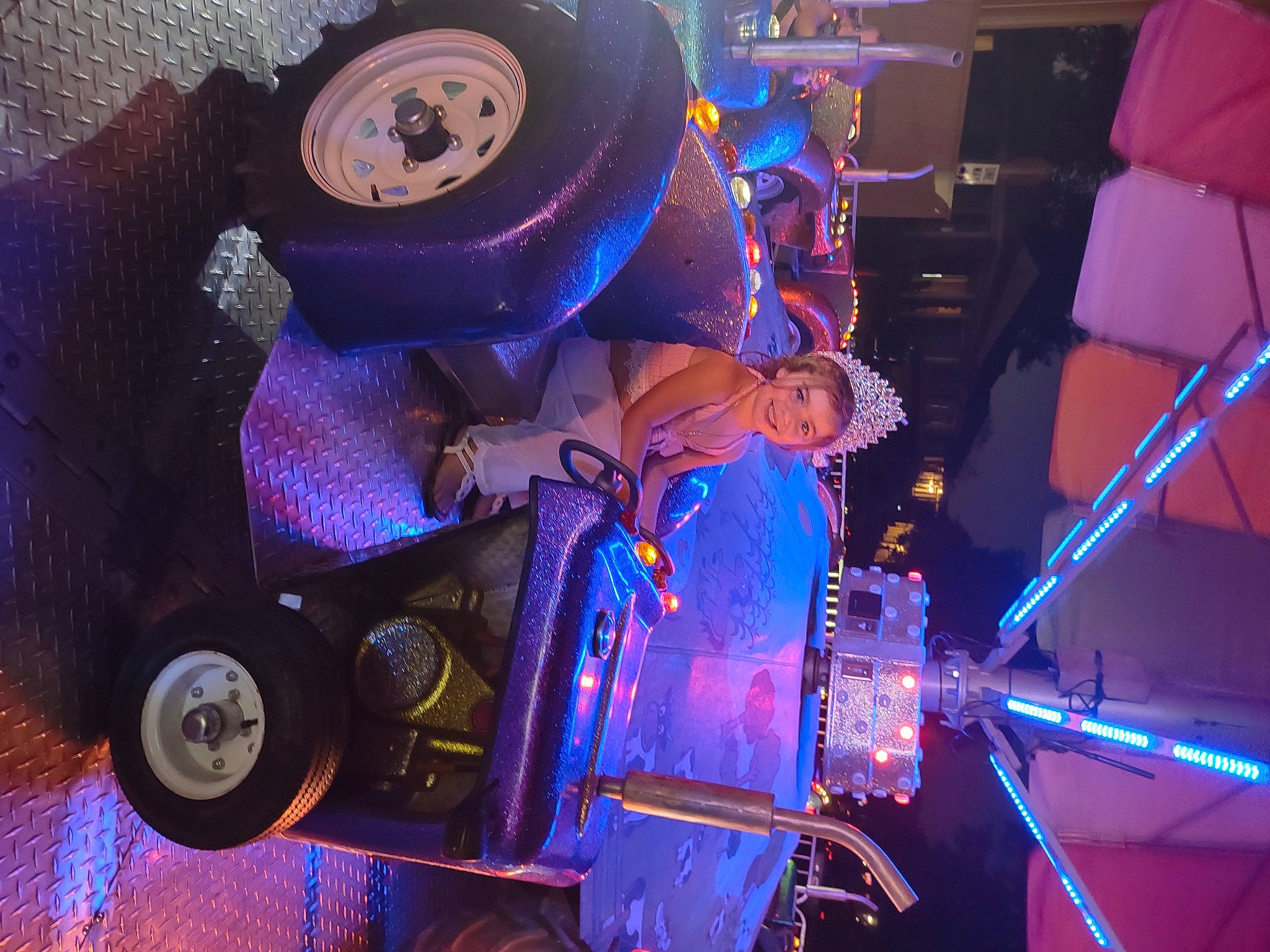 Remington is registered to the contest to win money with this photo: artist, blue, concert, drum, drumhead, electronic_instrument, entertainment, fun, idiophone, joy, light, magenta, membranophone, music, music_artist, musical_instrument, musician, performing_arts, person, purple