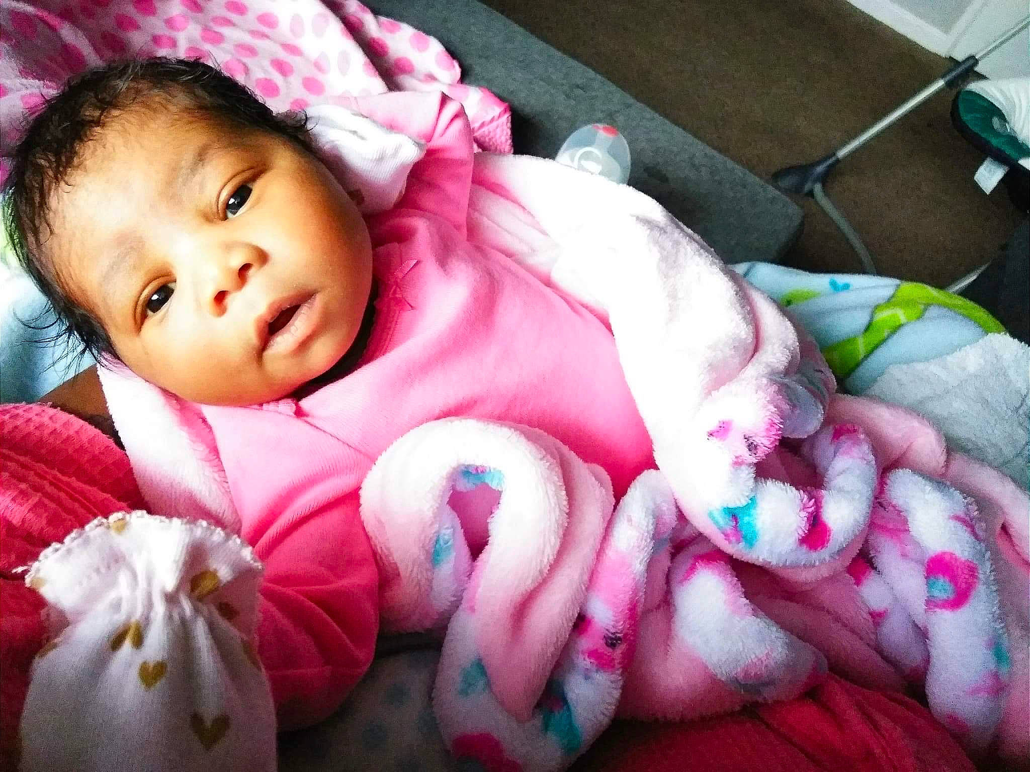 Layonah is registered to the contest to win money with this photo: baby, baby_products, bedtime, blanket, cheek, child, eye, mouth, nap, nose, person, pink, skin, smile, textile, toddler