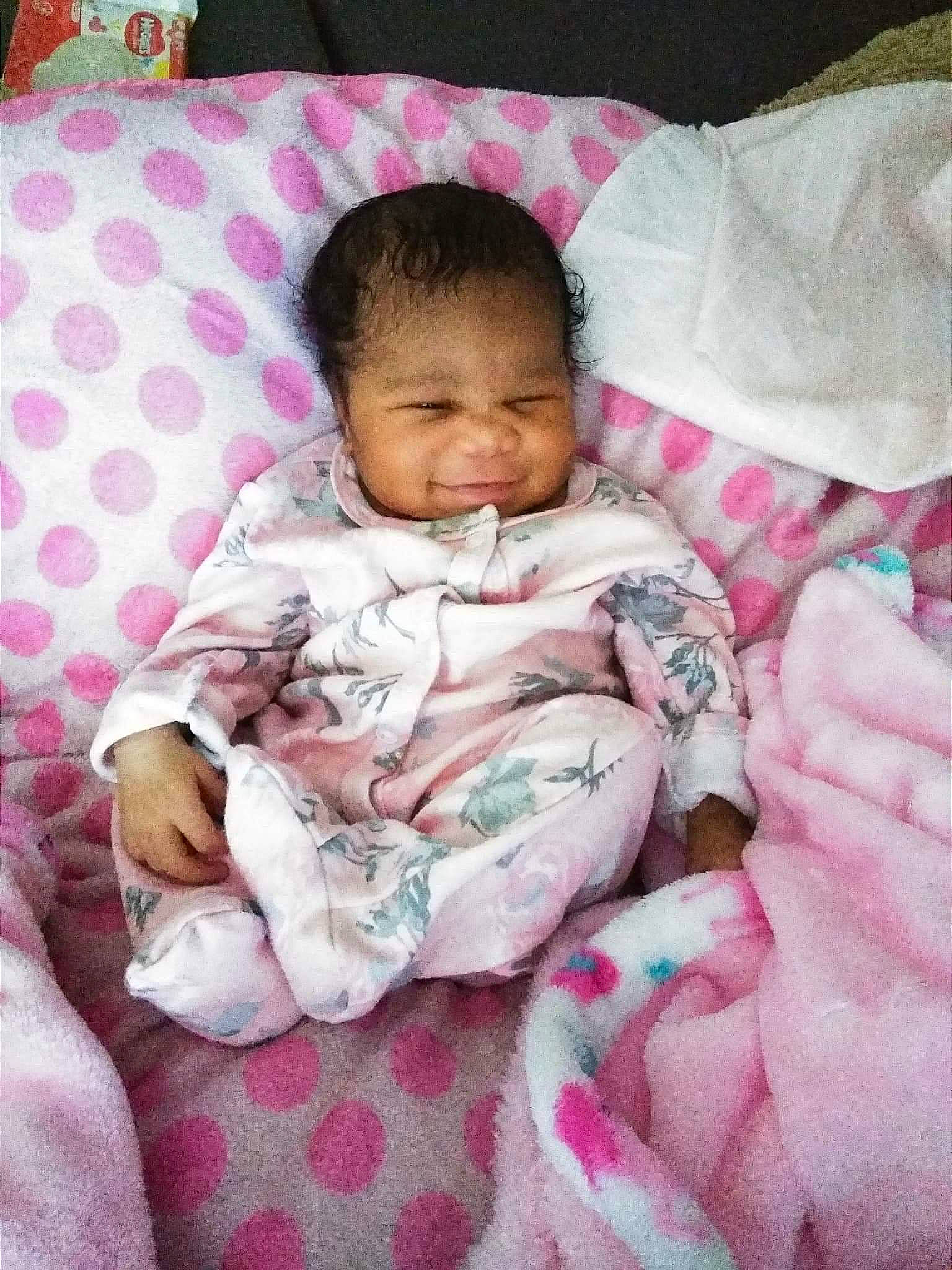 Layonah is registered to the contest to win money with this photo: baby, bedtime, birth, cheek, child, linens, person, pink, skin, smile, textile, toddler