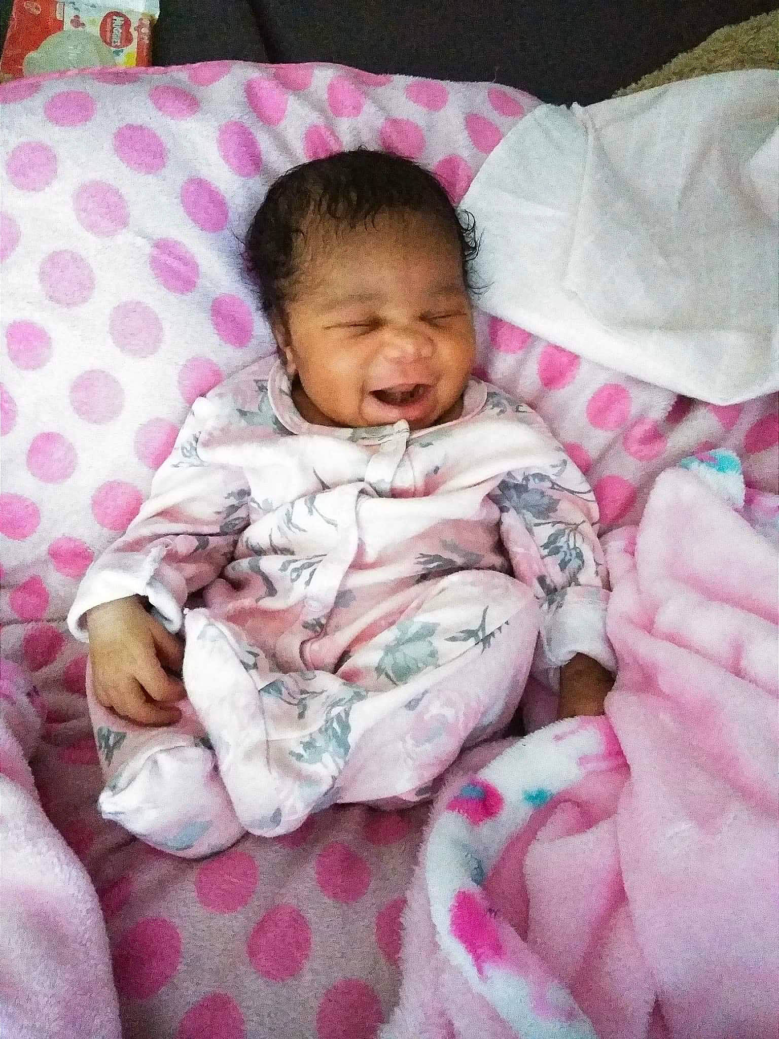 Layonah is registered to the contest to win money with this photo: baby, bedtime, birth, cheek, child, head, linens, person, pink, skin, smile, textile, toddler