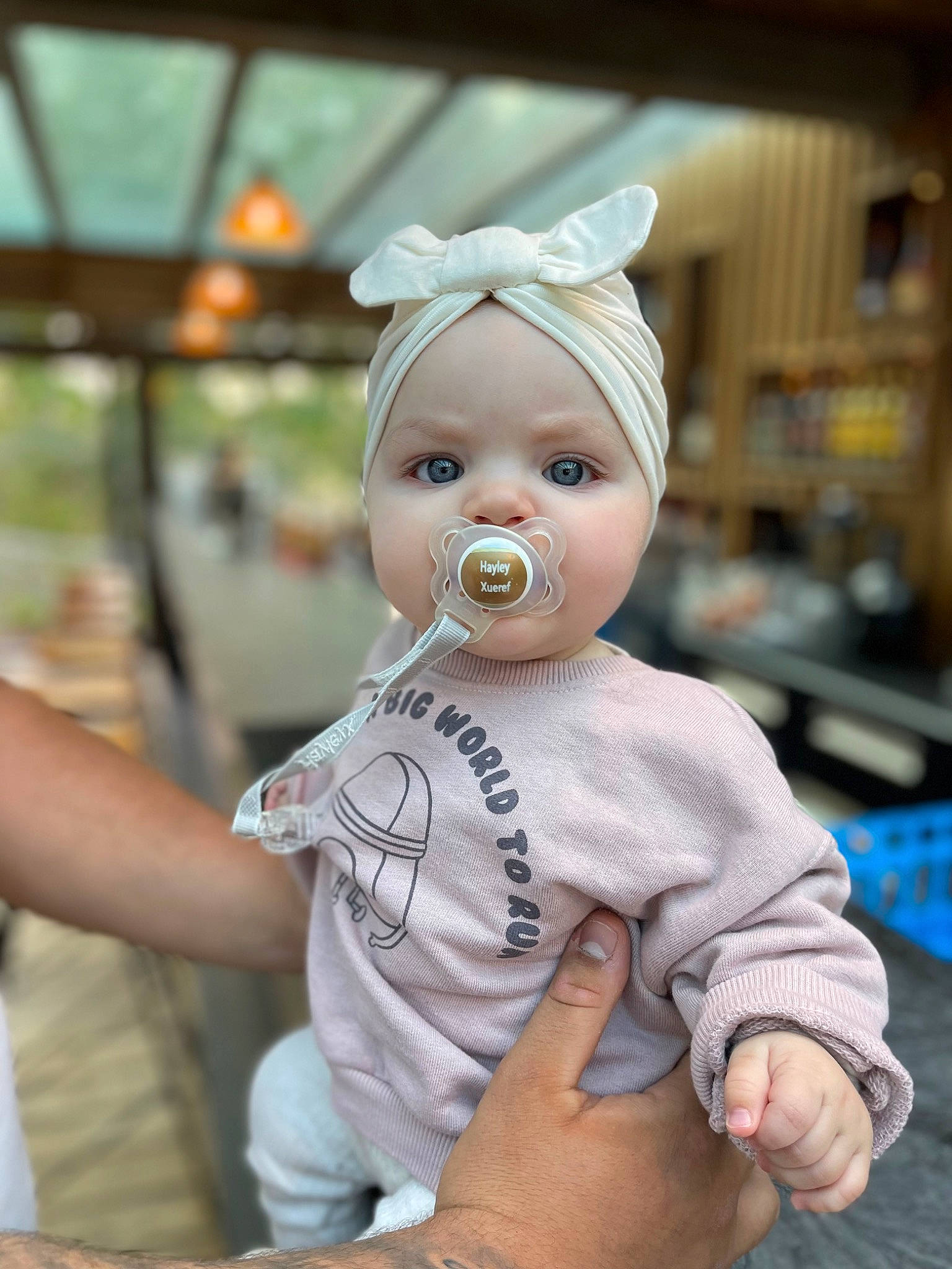 Hayley participe au concours pour gagner de l'argent avec cette photo : baby, baby_toddler_clothing, cap, cheek, child, costume, fashion_accessory, fun, gesture, happy, hat, headgear, headwear, leisure, person, recreation, sitting, toddler, vacation