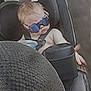 Aaxton is registered to the contest to win money with this photo: baby, car_seat, casual, child, comfort, drink_container, headrest, infant, portrait, reflection, relaxing, seat, seatbelt, sun_protection, sunglasses, travel, upholstery, vehicle_interior, window, young_child