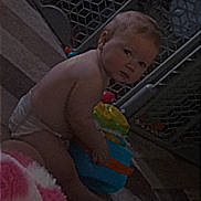 Aaxton is registered to the contest to win money with this photo: baby, baby_gate, blanket, carpet, child, childroom, crawling, curious, cute, diaper, floor, furniture, home, indoor, infant, person, play, seated, toy, young