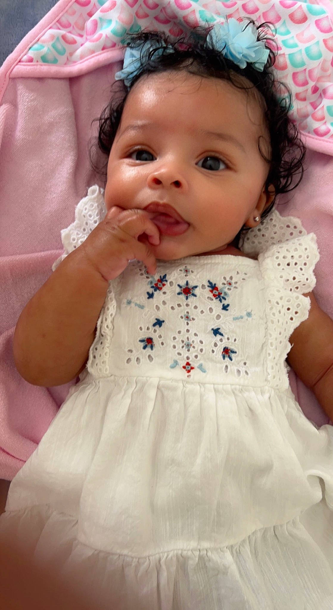 Hendrix is registered to the contest to win money with this photo: baby, baby_toddler_clothing, cheek, chin, dress, eye, eyebrow, eyelash, face, hairstyle, happy, head, headgear, iris, lip, one_piece_garment, person, pink, skin, sleeve