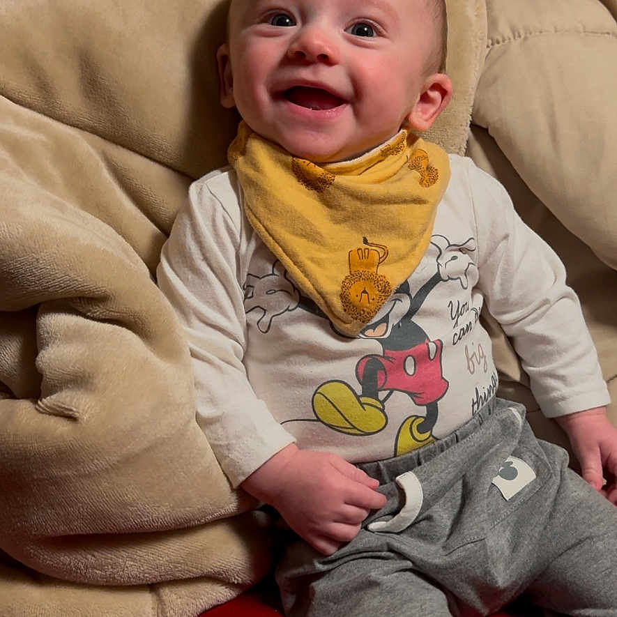 Aspen is registered to the contest to win money with this photo: baby, blanket, bodypart, clothing, couch, cushion, face, finger, furniture, hand, hat, head, homedecor, knitwear, newborn, pants, person, photography, portrait, sitting