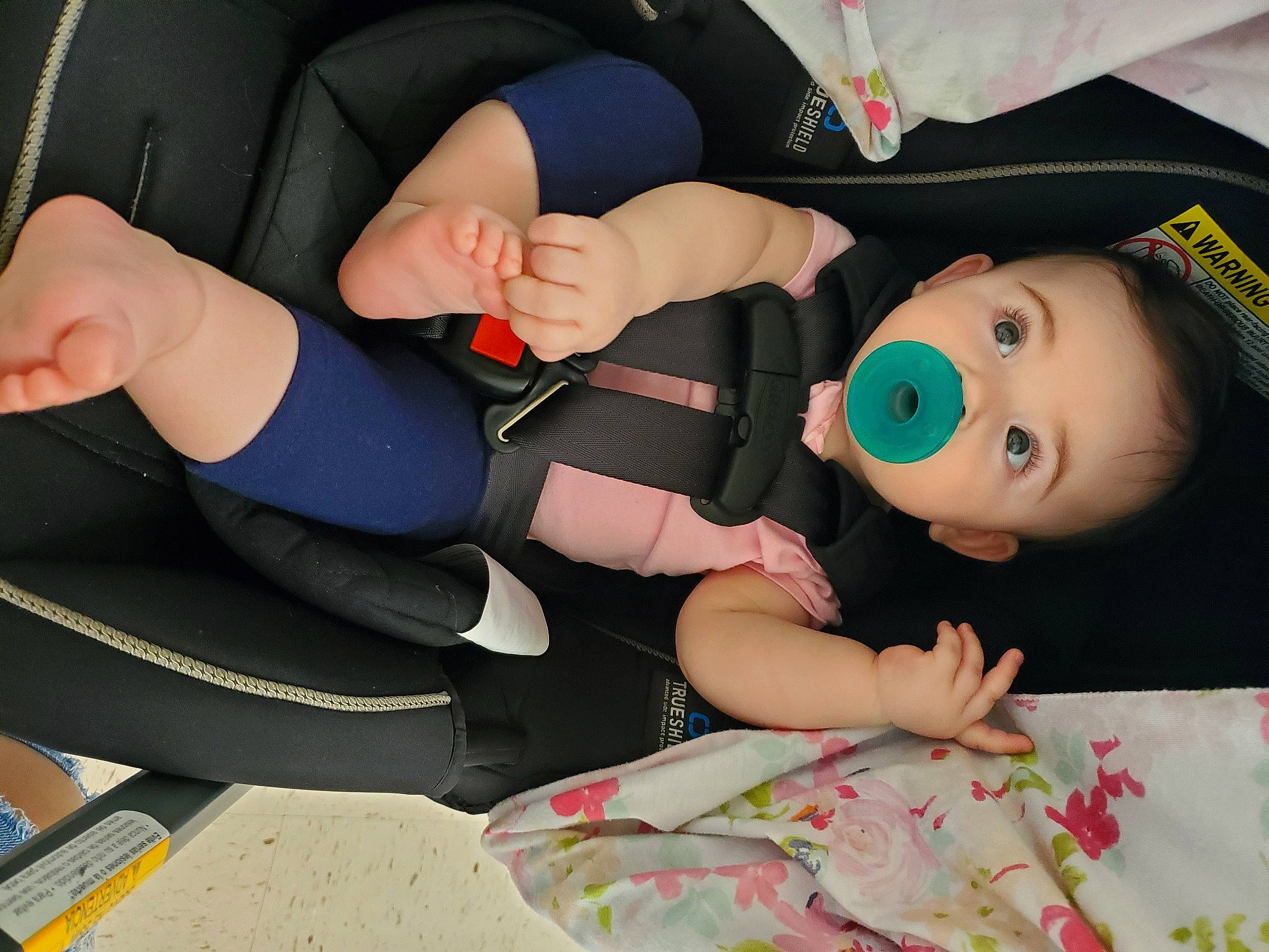 Holly is registered to the contest to win money with this photo: arm, auto_part, black_hair, child, finger, hand, leg, person, skin, thigh, toddler