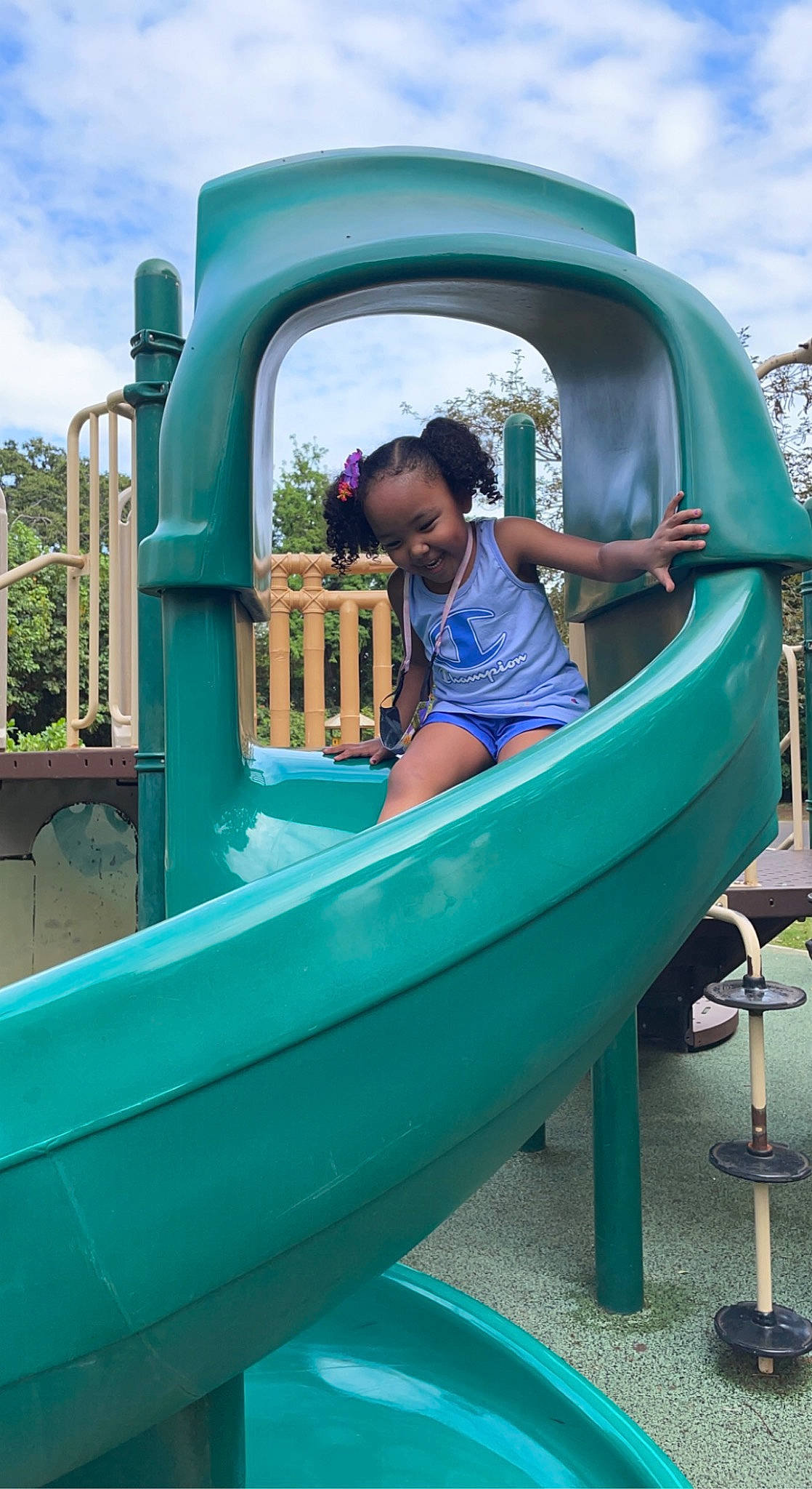 Zola is registered to the contest to win money with this photo: aqua, azure, blue, boat, boats_and_boating_equipment_and_supplies, bumper, chute, cloud, electric_blue, fun, green, leisure, outdoor_play_equipment, outdoor_recreation, person, playground_slide, recreation, skiff, sky, t_shirt