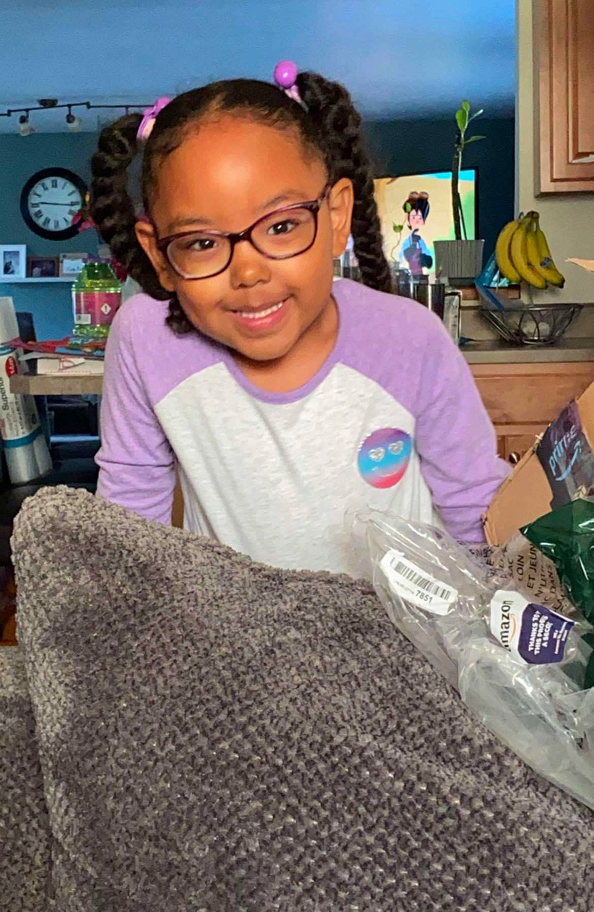 Zola joined the competition — help win amazing prizes! child, event, eyewear, flooring, fun, fur, happy, joy, linens, person, room, sitting, skin, smile, soil, t_shirt, toddler, vision_care