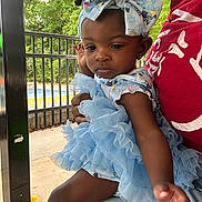 Zynaisjah joined the competition — help win amazing prizes! baby, blue_dress, casual, child, cute, daylight, expression, fashion, fence, hand, headband, outdoor, person, pool, portrait, red_shirt, sitting, toddler, trees, young_child