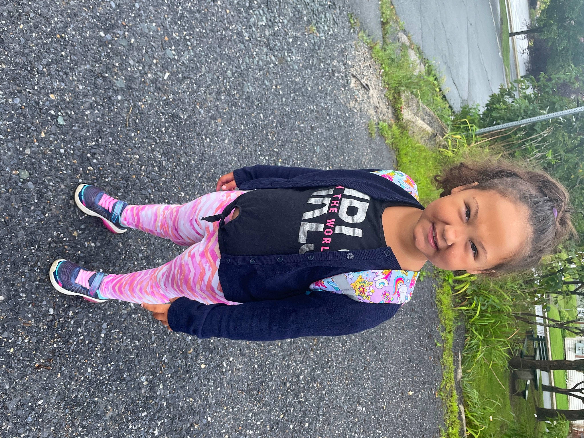 Karma is registered to the contest to win money with this photo: asphalt, carmine, child, electric_blue, fun, grass, happy, joy, leisure, magenta, people_in_nature, person, plant, recreation, road_surface, sidewalk, sleeve, smile, tar, toddler