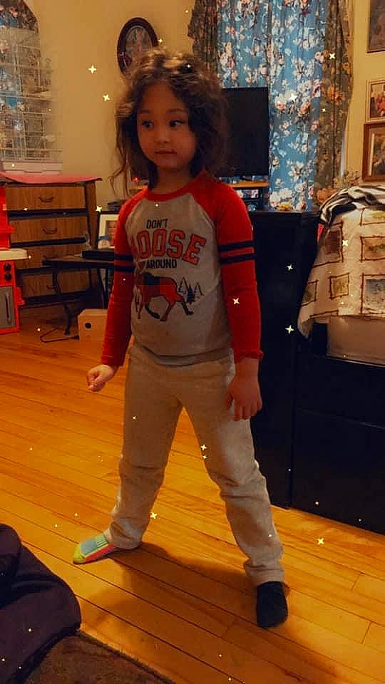 Karma is registered to the contest to win money with this photo: event, floor, flooring, hairstyle, hardwood, head, human_leg, joint, leg, person, shoe, sleeve, sneakers, sportswear, standing, t_shirt, thigh, toddler, trunk, waist