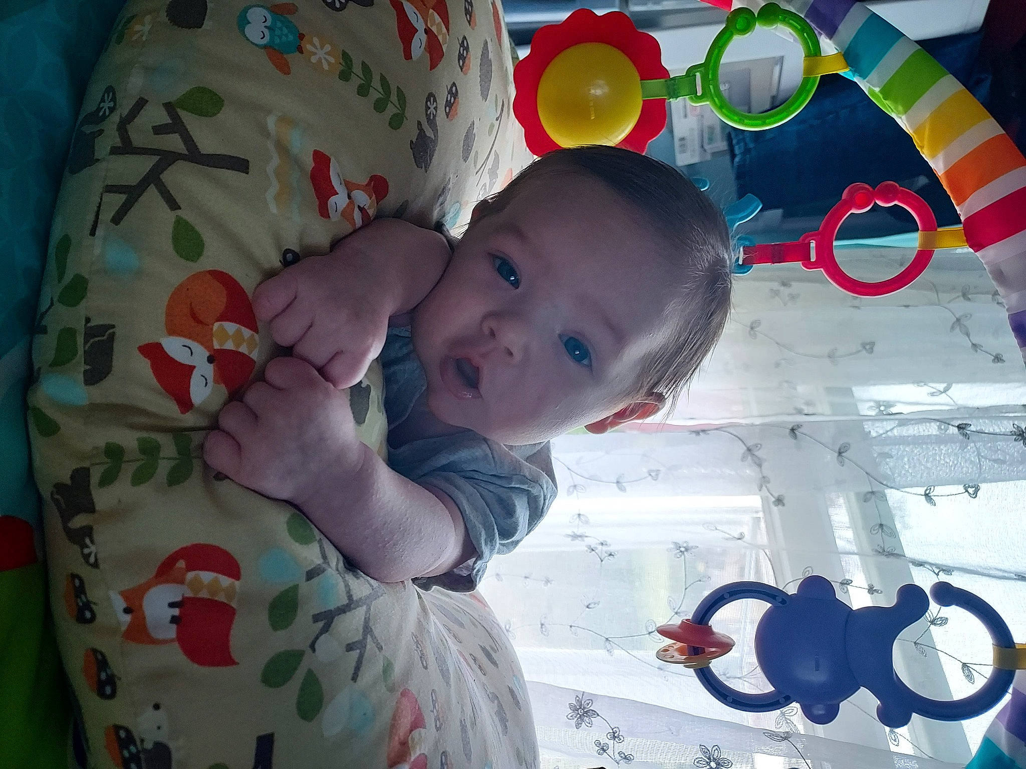 Layne is registered to the contest to win money with this photo: baby, baby_products, baby_toddler_clothing, baby_toys, carmine, cheek, child, circle, eye, fun, happy, linens, pattern, person, play, product, room, smile, textile, toddler