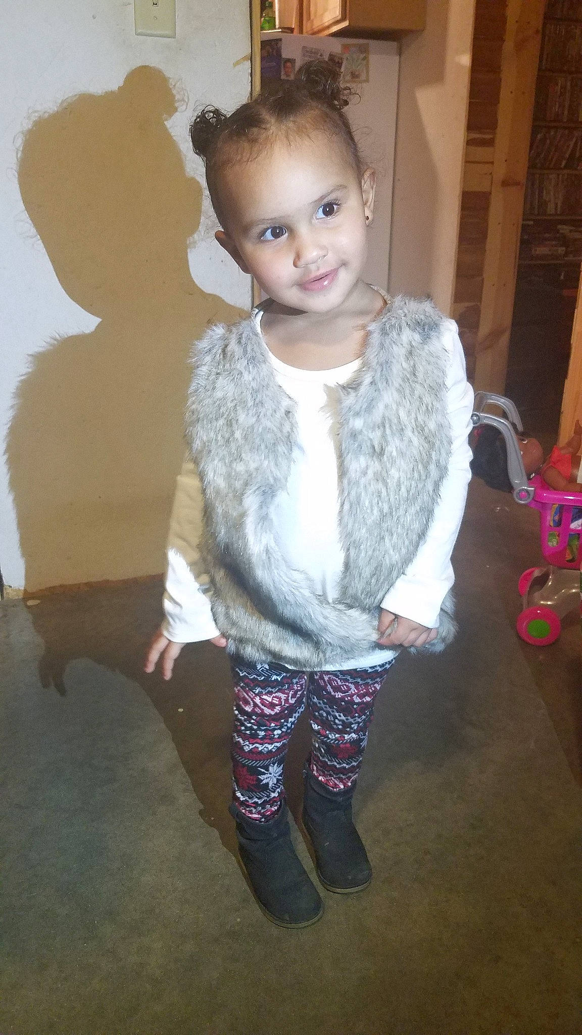 Teagan joined the competition — help win amazing prizes! child, child_model, fur, fur_clothing, girl, human_hair_color, outerwear, person, product, skin, standing, textile, tights, toddler, trunk