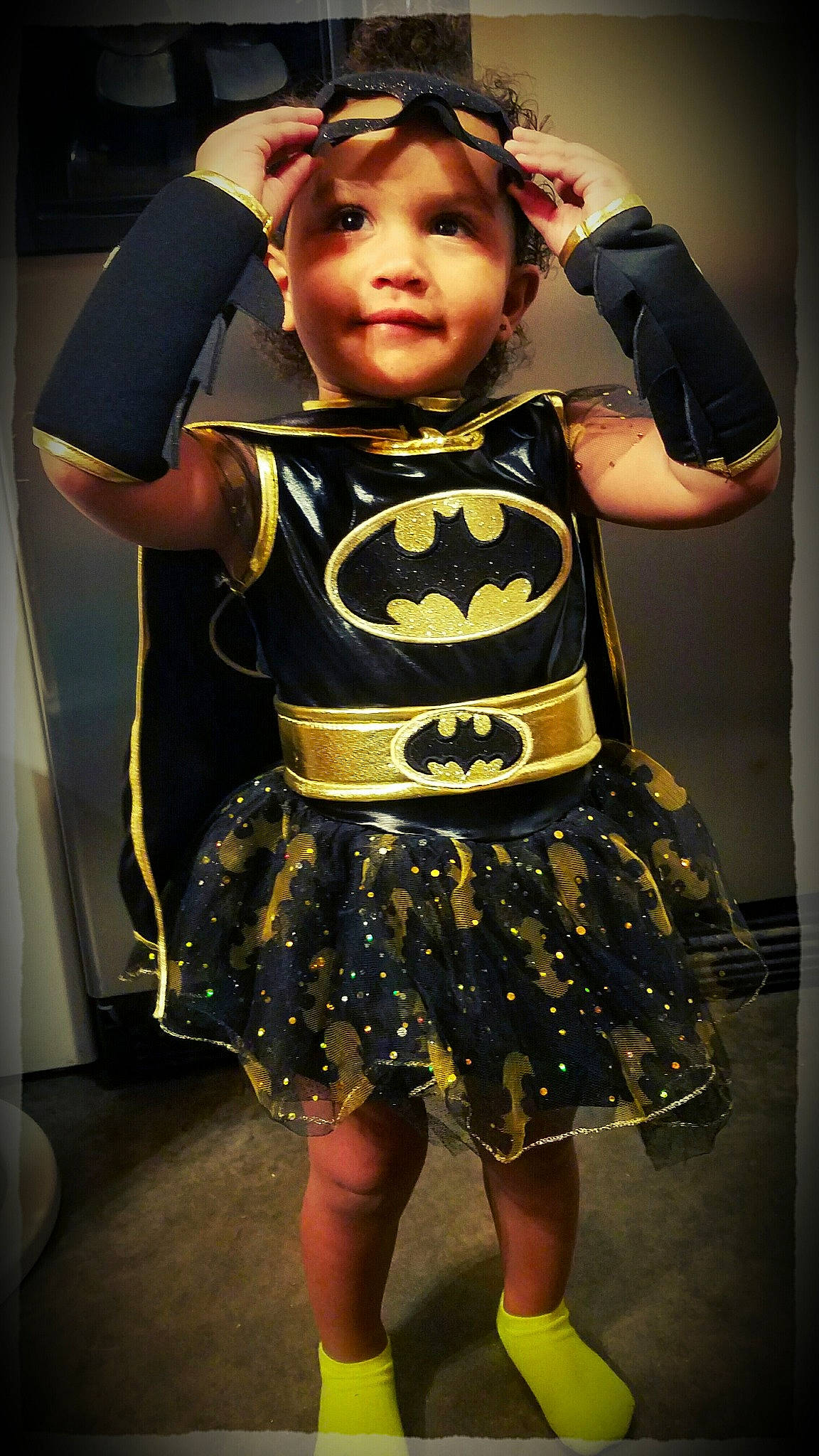 Teagan is registered to the contest to win money with this photo: child, clothing, costume, fun, girl, headwear, person, product, toddler, yellow