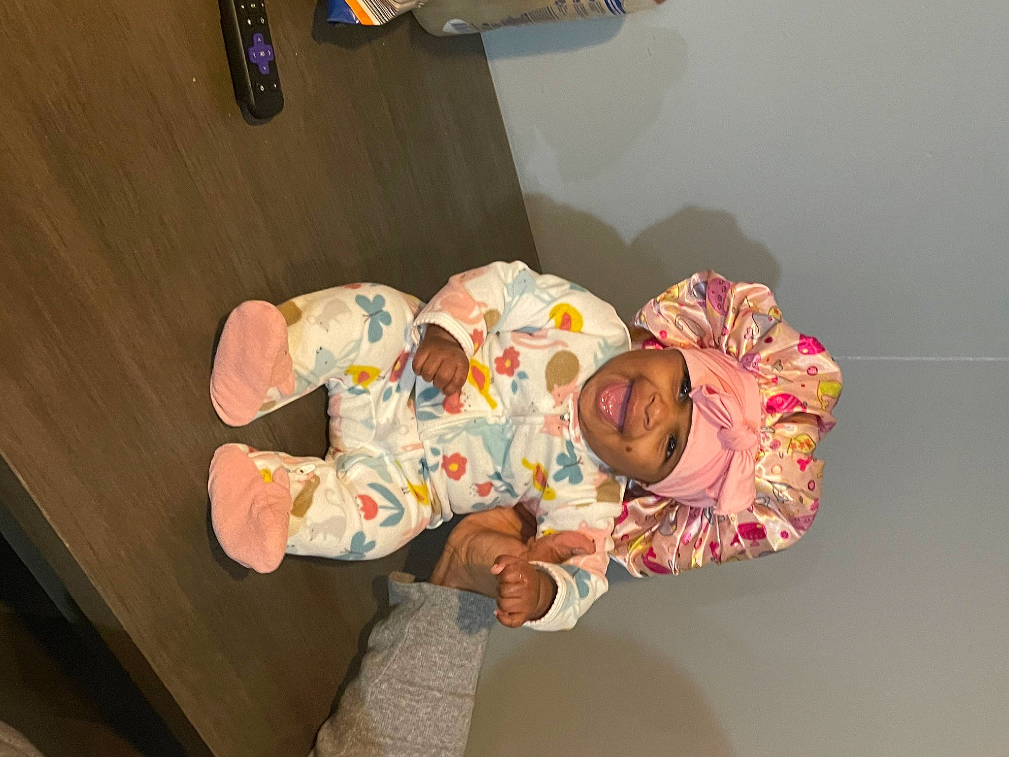 Janylah joined the competition — help win amazing prizes! baby, baby_toddler_clothing, child, comfort, flooring, foot, fun, hardwood, headwear, person, room, sleeve, smile, toddler, wood