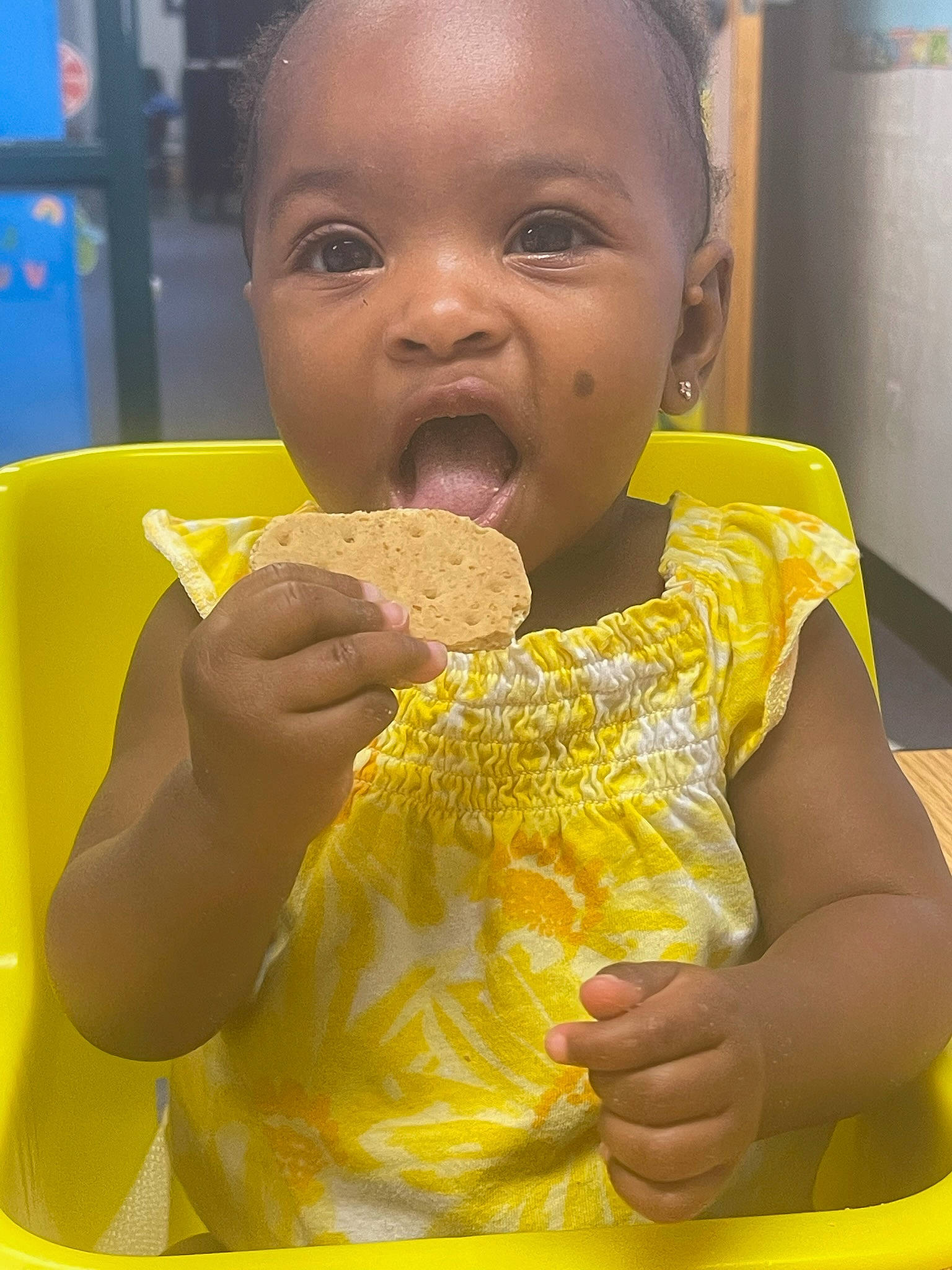 Janylah is registered to the contest to win money with this photo: baby_toddler_clothing, baked_goods, biting, child, comfort_food, cuisine, dessert, dish, finger, finger_food, food, food_craving, fun, hand, happy, junk_food, person, sweetness, thumb, toddler