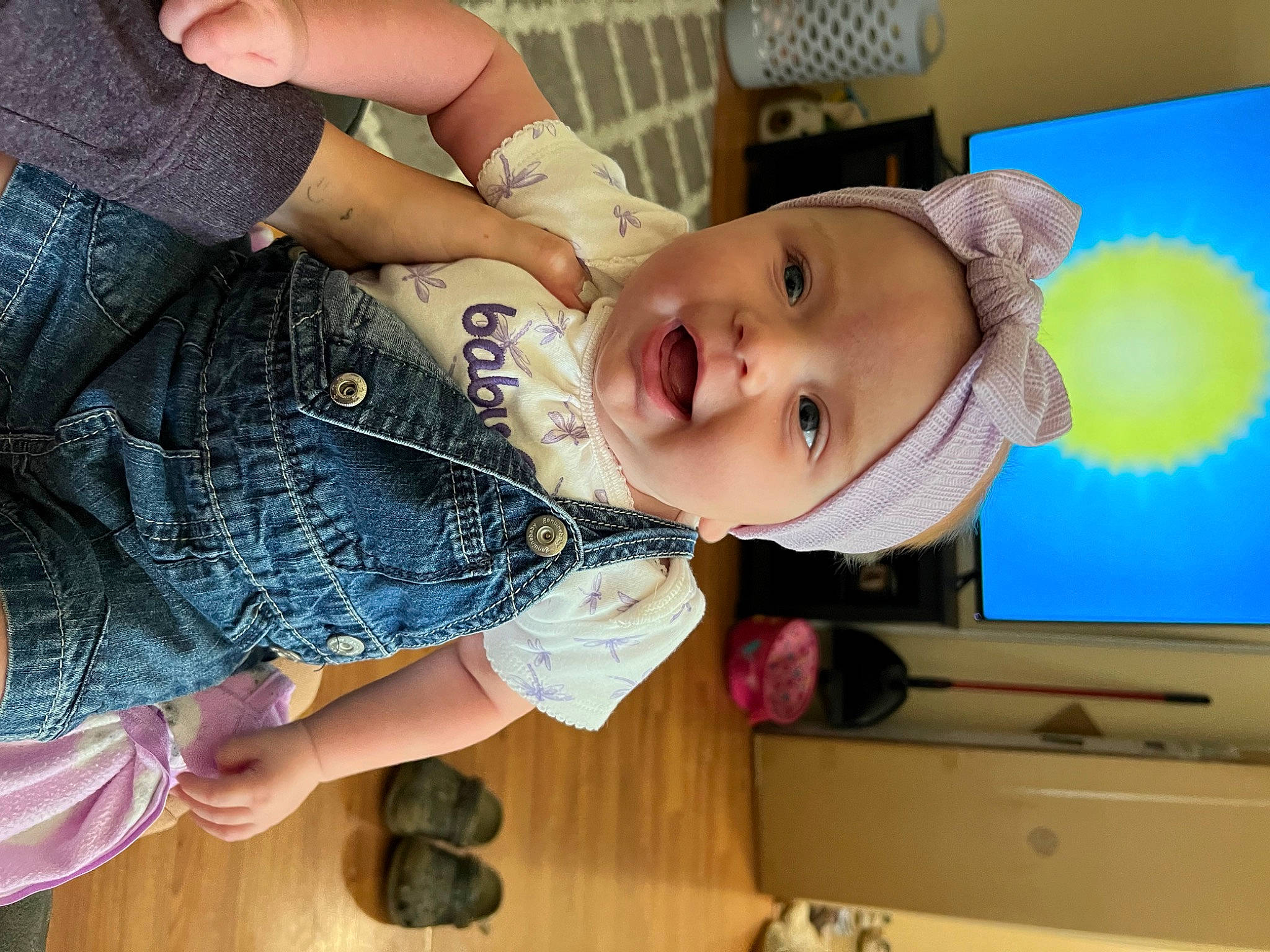 Alyvia is registered to the contest to win money with this photo: abdomen, baby, baby_toddler_clothing, blue, chest, child, denim, electric_blue, finger, fun, gesture, hand, happy, headwear, nail, person, skin, smile, thumb, toddler