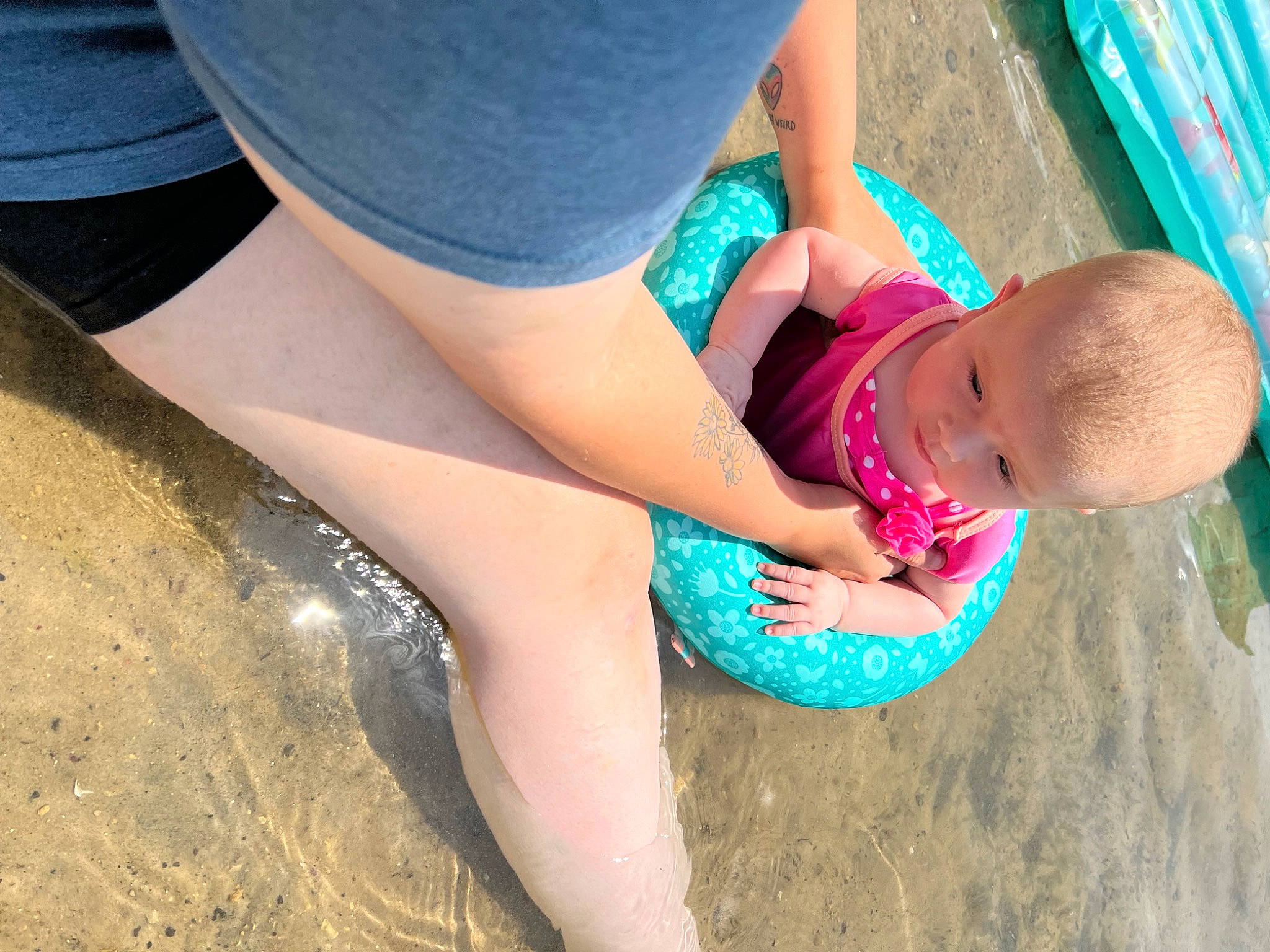 Alyvia is registered to the contest to win money with this photo: baby, blue, calf, finger, glasses, grass, hand, happy, human_body, knee, leg, leisure, people_in_nature, person, shorts, sunglasses, textile, thigh, toddler, waist