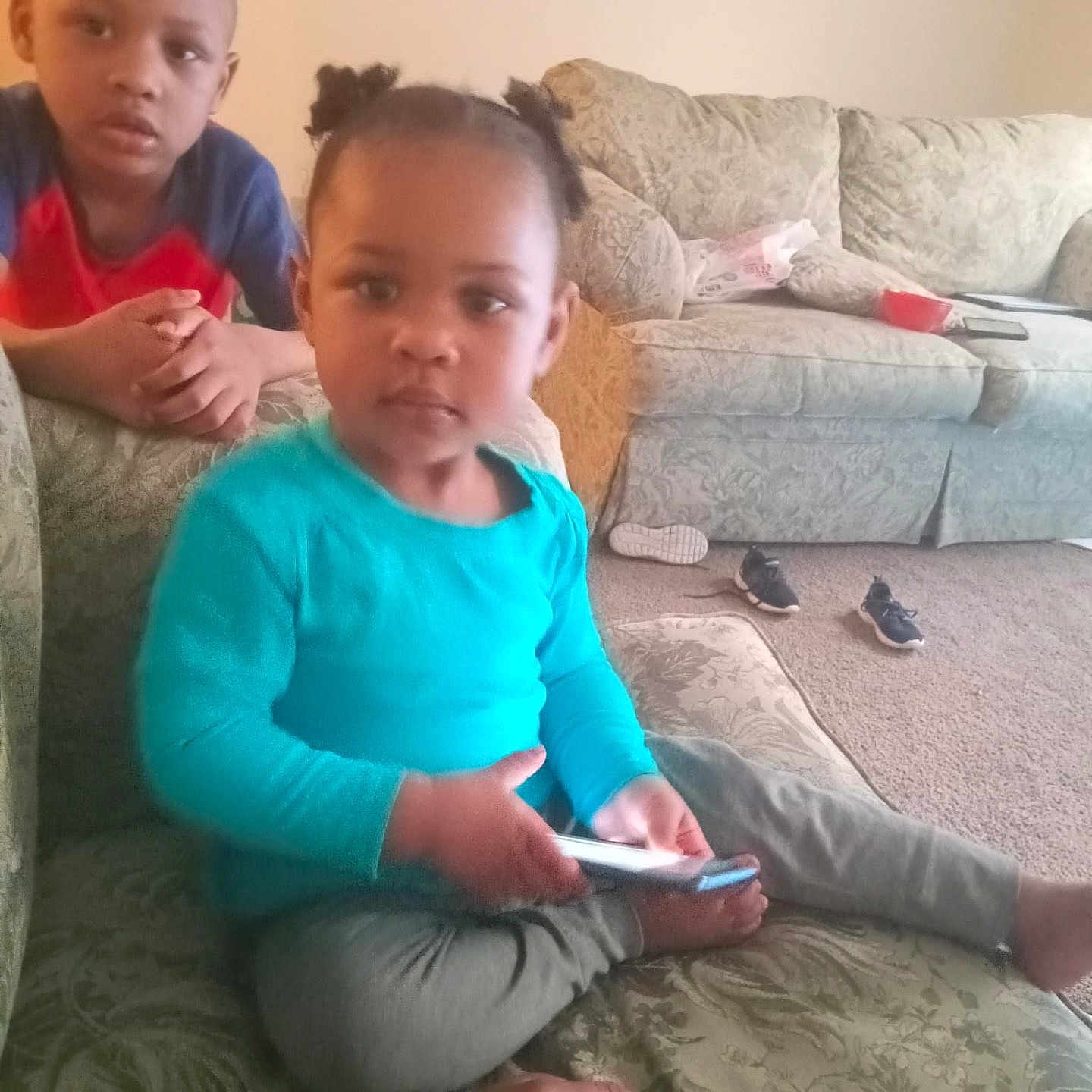 Aliyah is registered to the contest to win money with this photo: architecture, baby, boy, building, child, clothing, couch, cushion, face, furniture, head, homedecor, indoors, livingroom, male, person, photography, portrait, room, t_shirt
