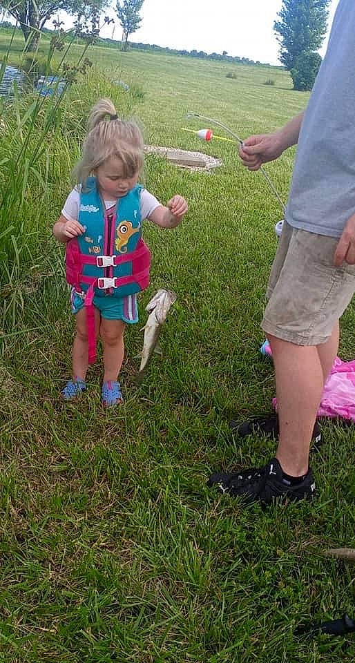 Avalynn joined the competition — help win amazing prizes! barefoot, child, event, foot, fun, grass, grassland, human_leg, lawn, meadow, people_in_nature, person, plant, recreation, sandal, shoe, shorts, soil, t_shirt, terrestrial_plant