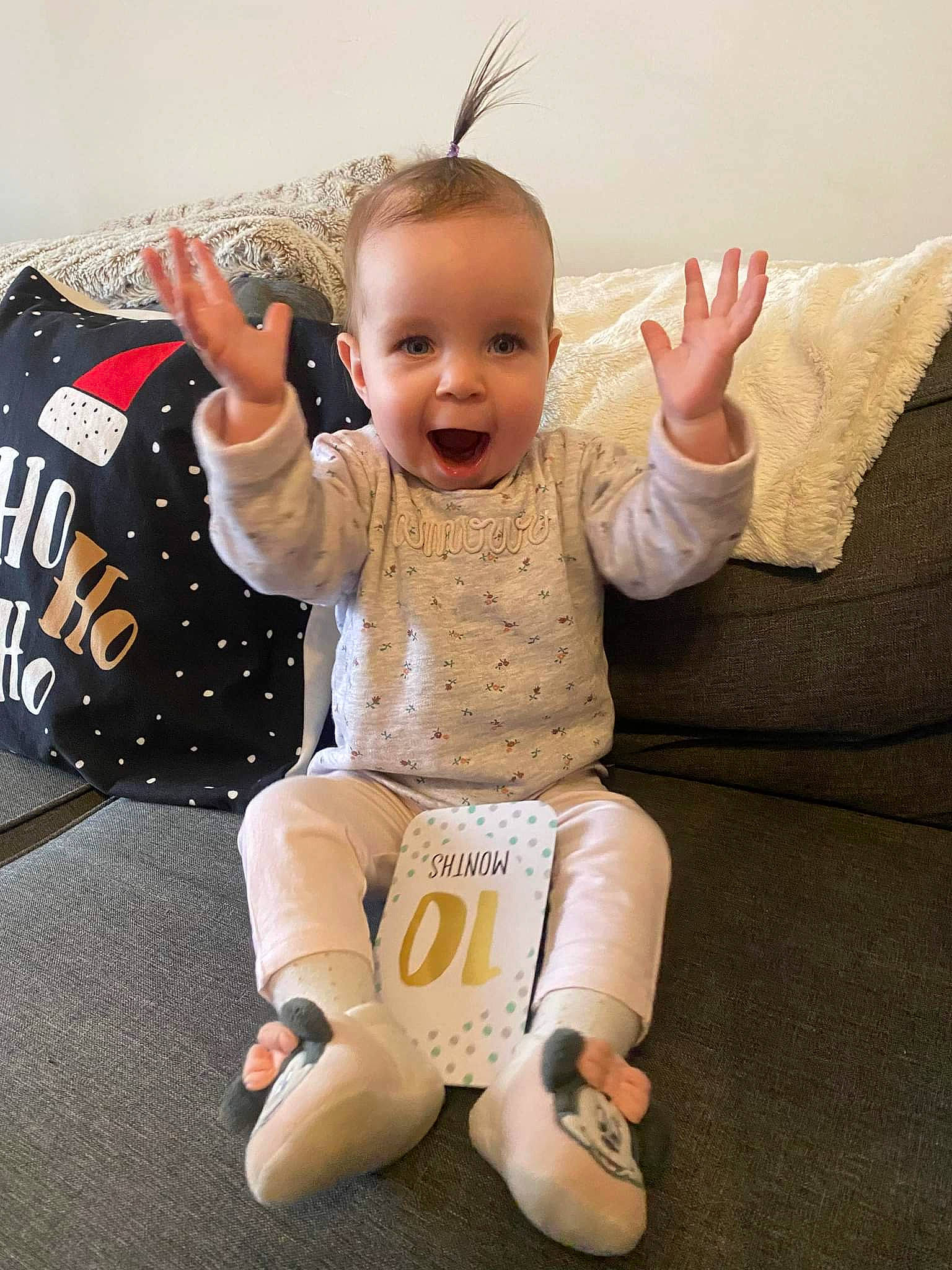 Joanna participe au concours pour gagner de l'argent avec cette photo : baby, baby_toddler_clothing, cheek, child, comfort, couch, eye, face, finger, gesture, happy, head, human_body, knee, person, skin, sleeve, smile, thigh, thumb