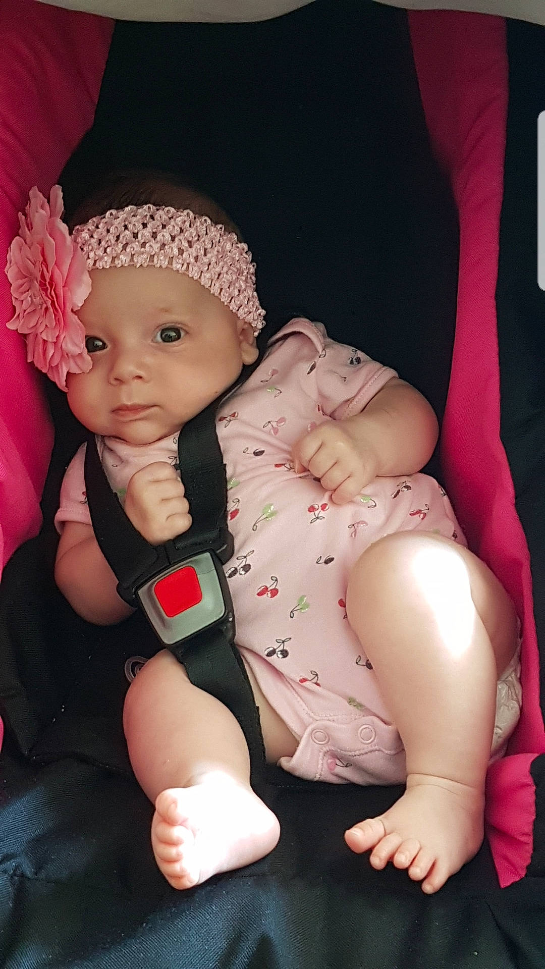 Madison a rejoint le concours — aidez-le/la à gagner de superbes lots ! baby, baby_toddler_clothing, beanie, bonnet, cap, cheek, child, hat, headgear, headwear, knit_cap, person, pink, product, sitting, skin, toddler