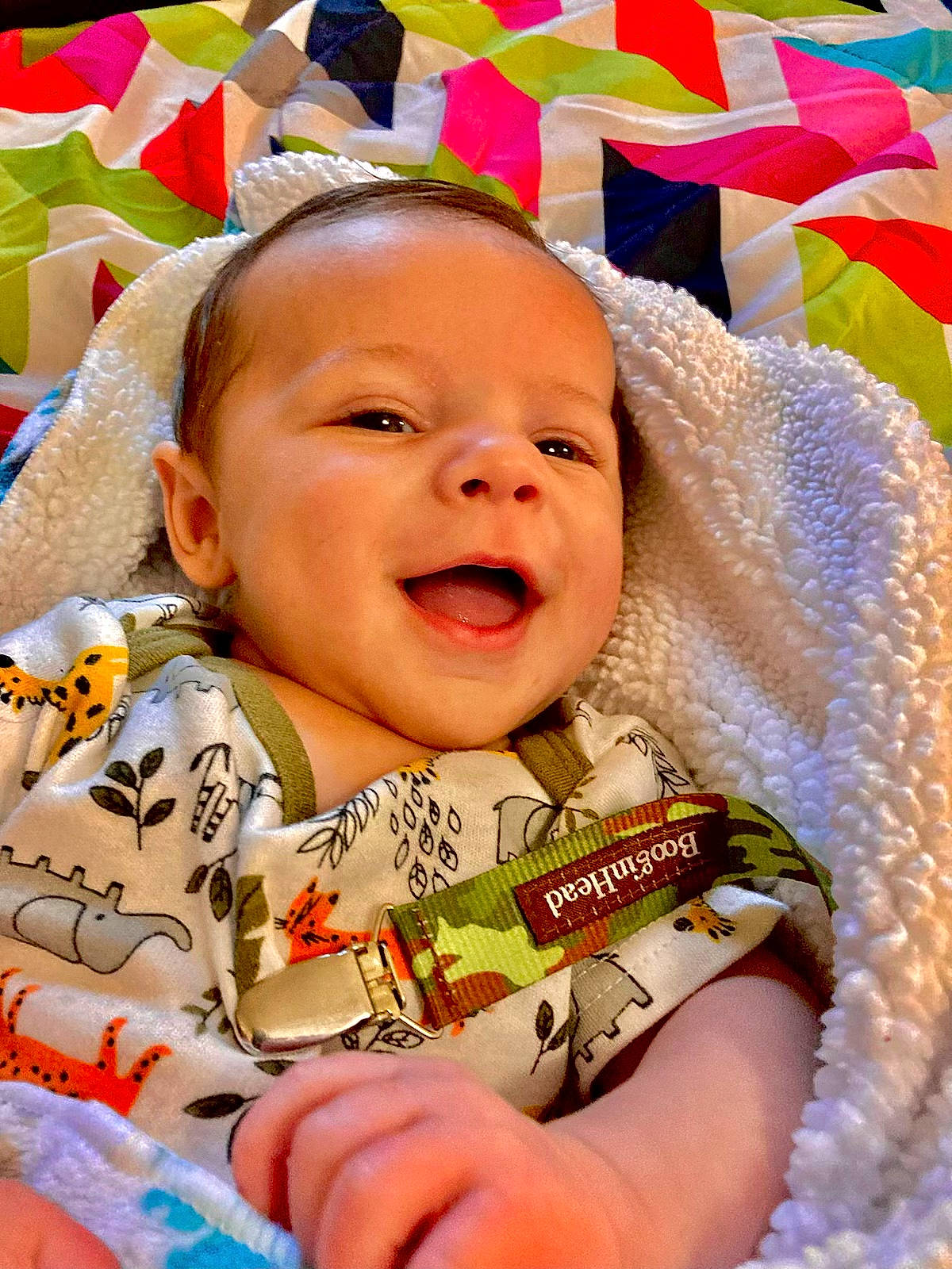 Kenzo is registered to the contest to win money with this photo: baby, baby_laughing, baby_toddler_clothing, cheek, chin, eye, fun, gesture, happy, head, iris, leisure, lip, nose, orange, people_in_nature, person, product, skin, smile
