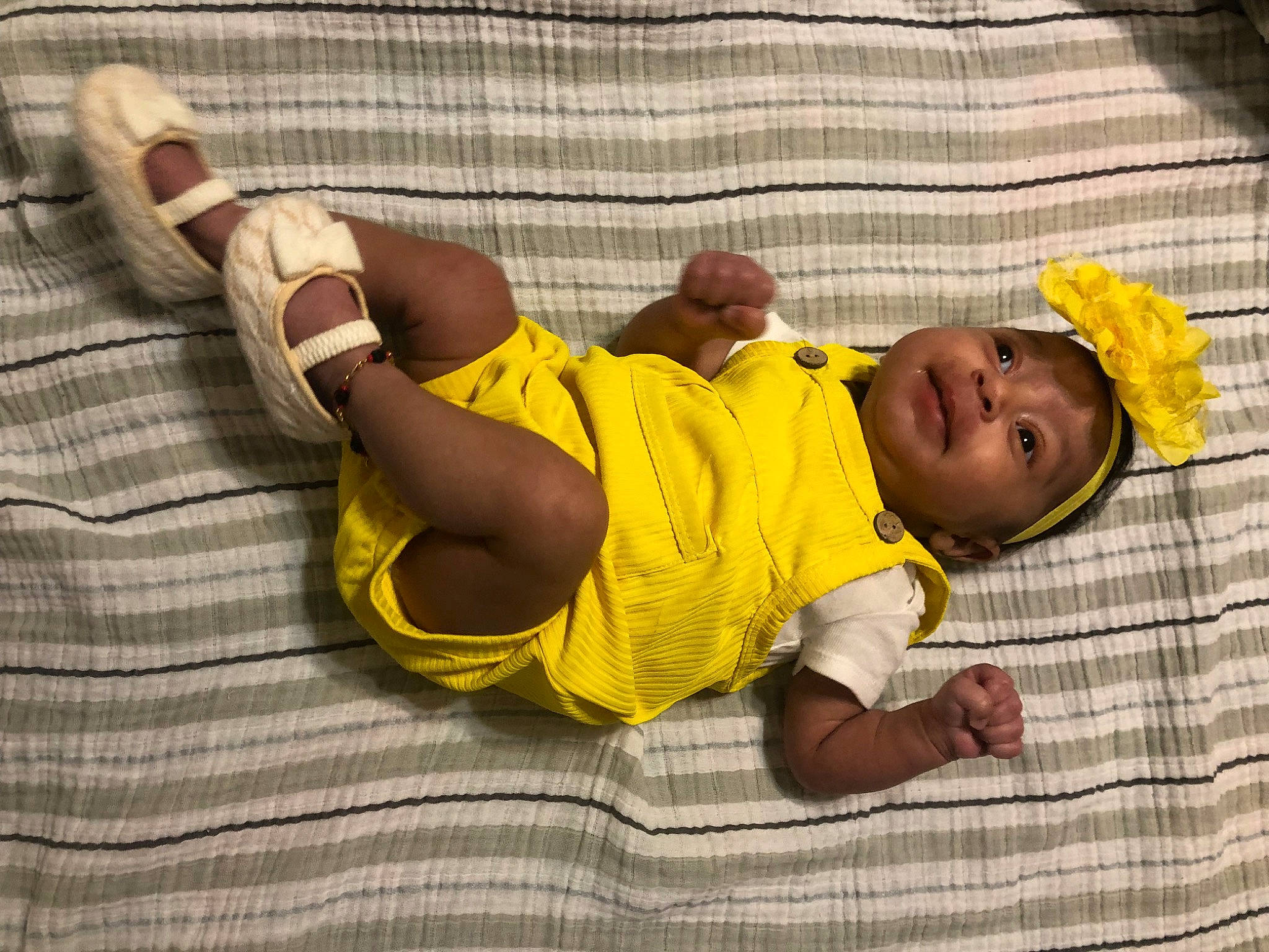 Jaylaniece is registered to the contest to win money with this photo: baby, baby_products, baby_safety, baby_sleeping, baby_toddler_clothing, child, comfort, facial_expression, finger, flooring, happy, infant_bodysuit, leg, linens, person, sleeve, smile, t_shirt, thigh, toddler