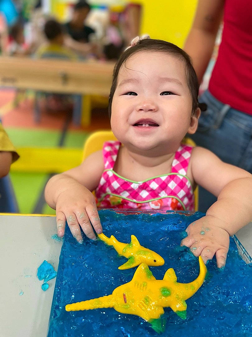 Isla joined the competition — help win amazing prizes! adaptation, beauty, chair, child, event, flooring, fun, happy, joy, leisure, person, petal, plant, play, recreation, skin, smile, snapshot, table, toddler