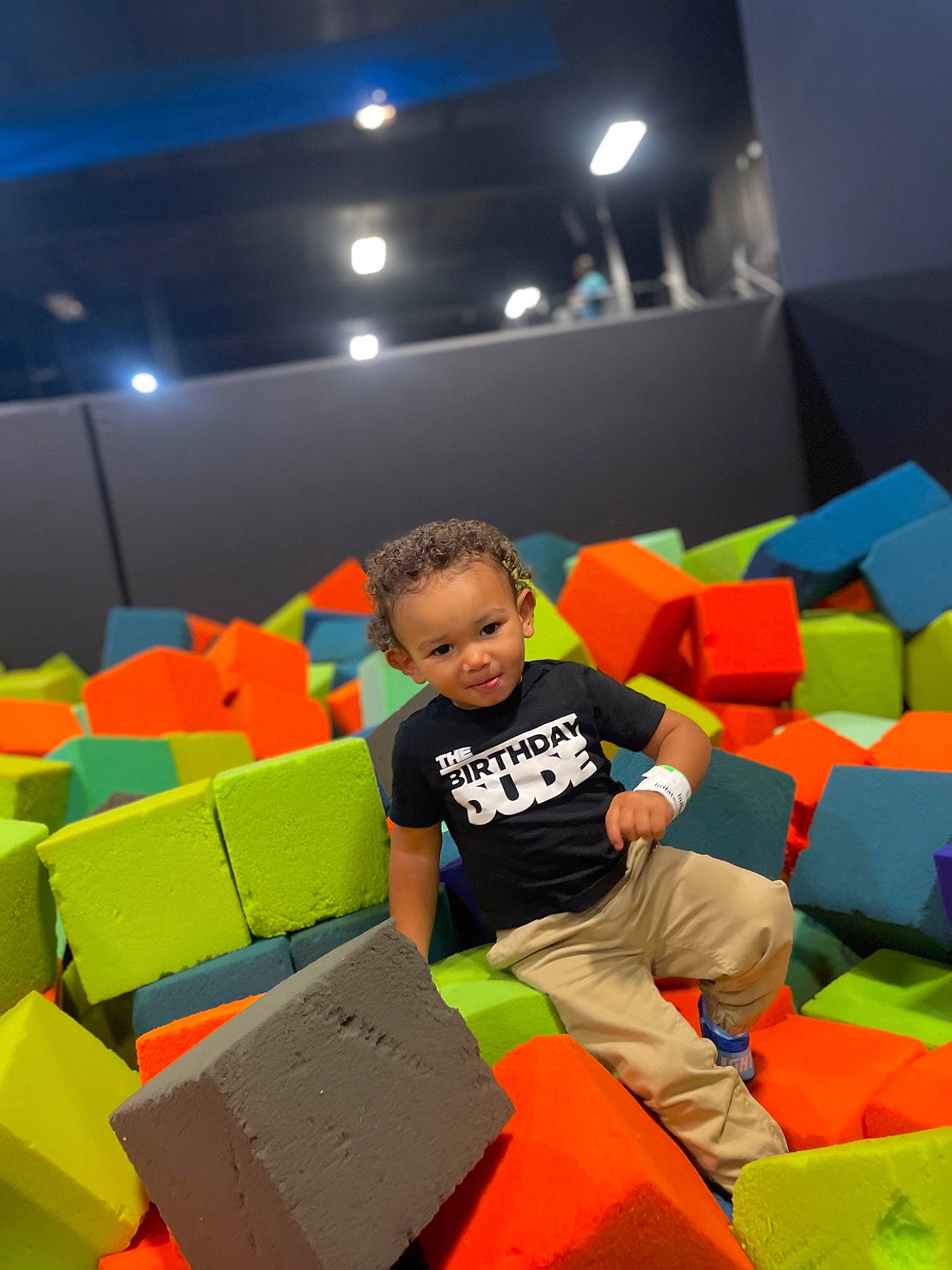 Kalvin joined the competition — help win amazing prizes! child, comfort, couch, flooring, fun, inflatable, leisure, orange, paper_product, person, plastic, play, recreation, room, sitting, t_shirt, toddler