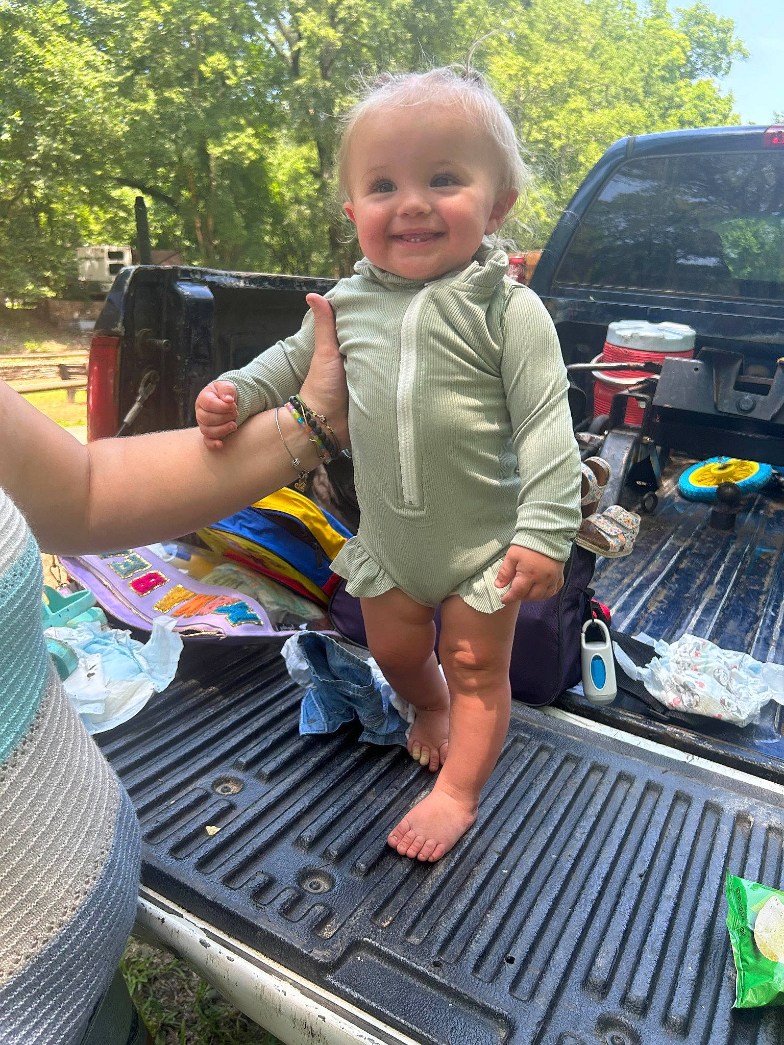 Hadley joined the competition — help win amazing prizes! automotive_exterior, automotive_tire, bumper, car, child, family_car, flip_flops, fun, grass, joy, lap, leisure, motor_vehicle, person, recreation, shorts, smile, toddler, travel, tree