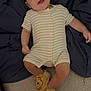 Sidjil a rejoint le concours — aidez-le/la à gagner de superbes lots ! baby, infant, smiling, striped_onesie, blanket, navy_blue, winnie_the_pooh, slippers, footwear, happy, lying_down, candid, hand, legs, cozy, indoor, cute, person, child, sleepwear