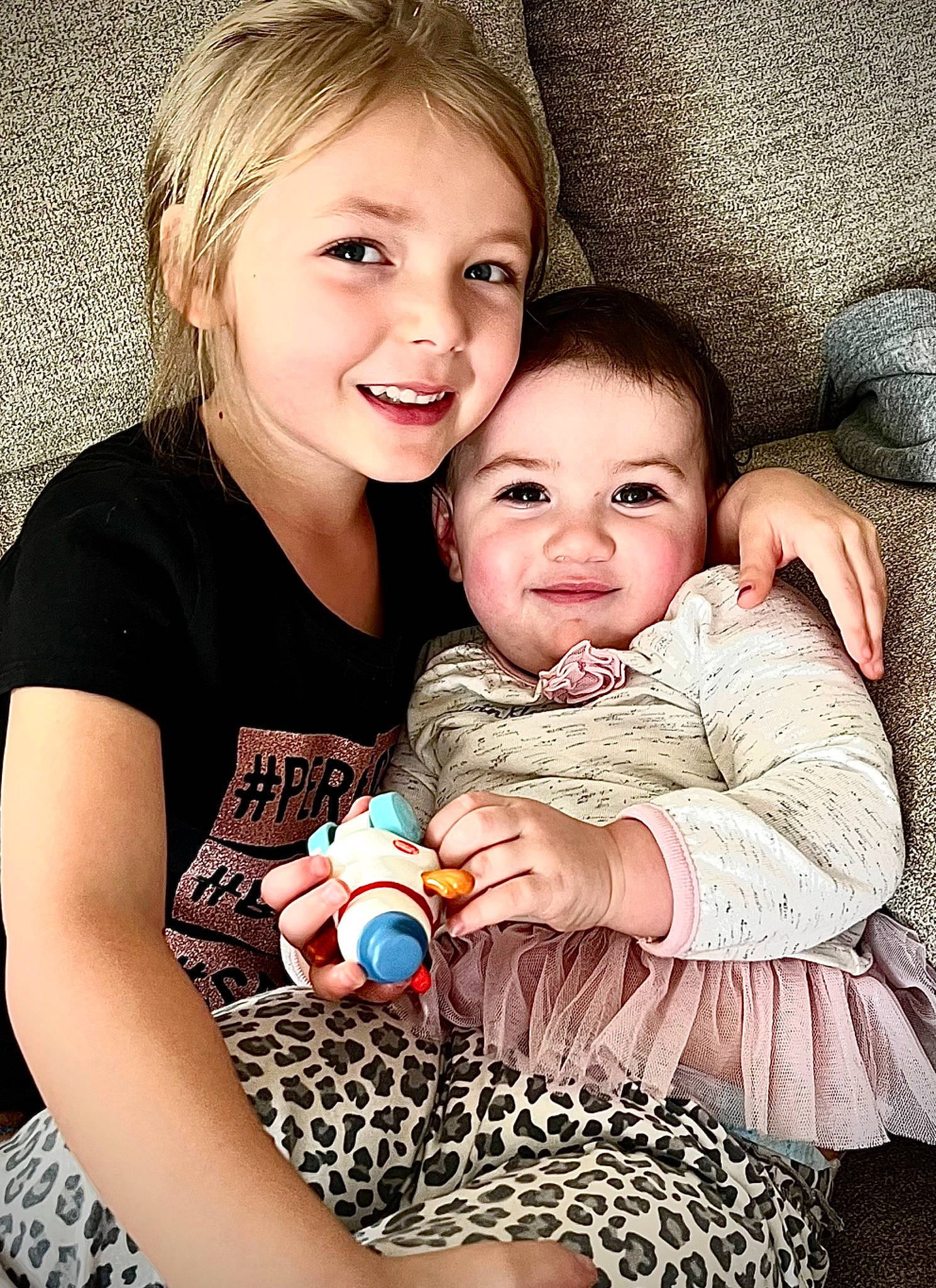 Aurora joined the competition — help win amazing prizes! baby, baby_toddler_clothing, cheek, eye, face, facial_expression, flash_photography, gesture, hairstyle, hand, happy, head, interaction, iris, joy, mammal, organ, person, pink, skin