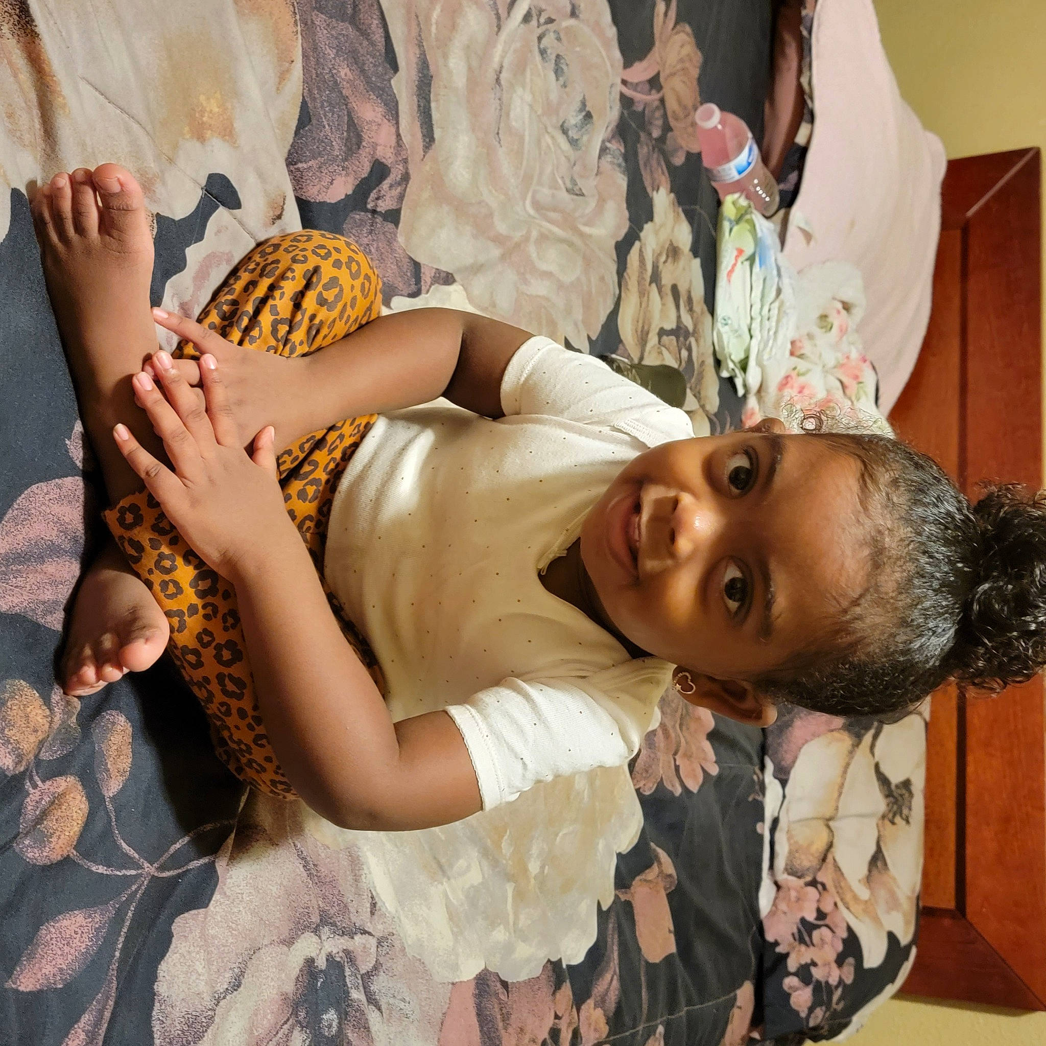 Aavani is registered to the contest to win money with this photo: abdomen, black_hair, bridal_clothing, child, dress, event, facial_expression, fashion_design, fun, happy, headgear, human_body, human_leg, jewellery, joy, person, skin, thigh, tree, trunk