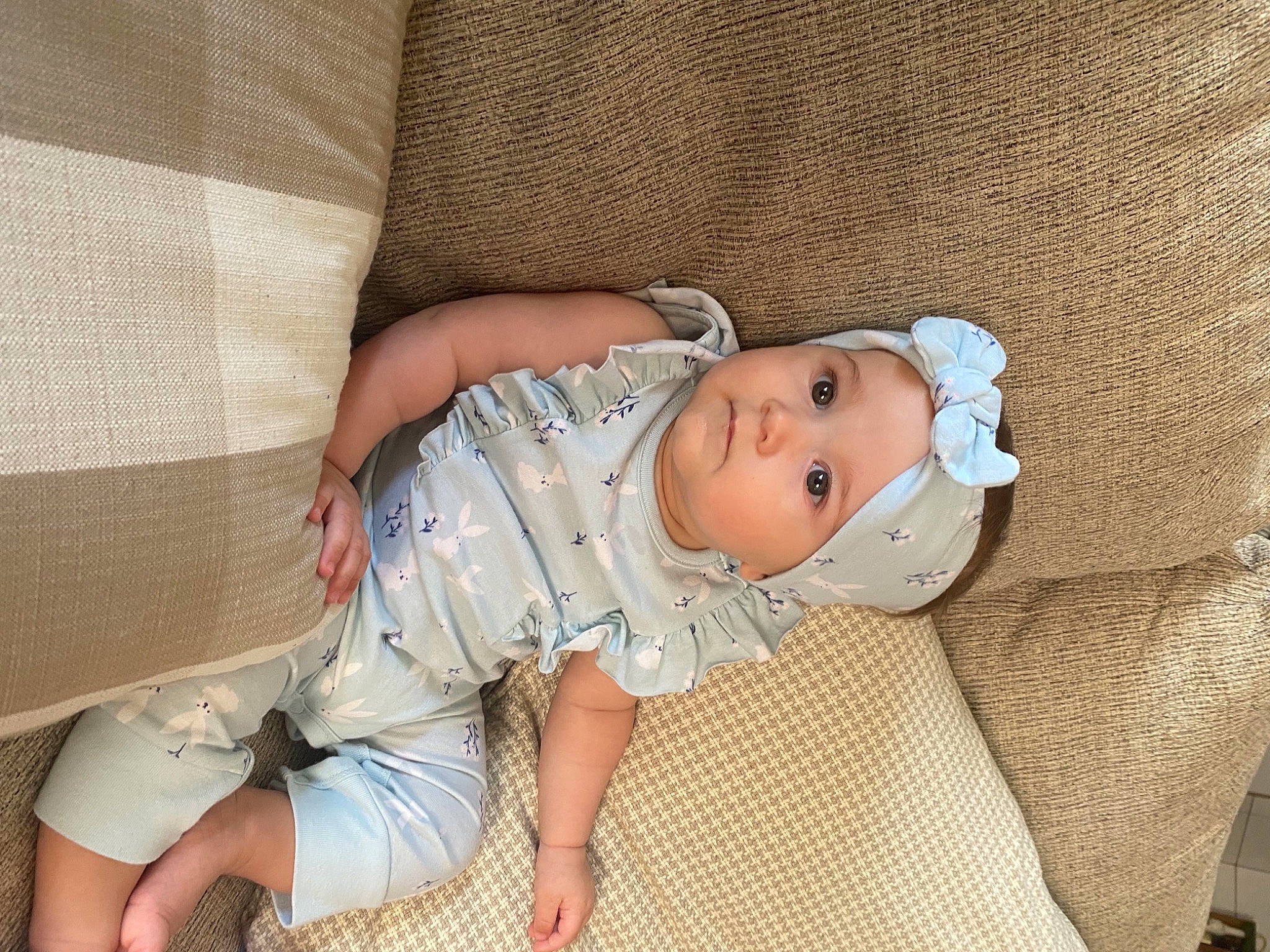 Gabriella joined the competition — help win amazing prizes! baby, baby_products, baby_sleeping, baby_toddler_clothing, bedtime, cheek, child, comfort, couch, eye, foot, headwear, iris, linens, pattern, person, room, sitting, skin, sleeve