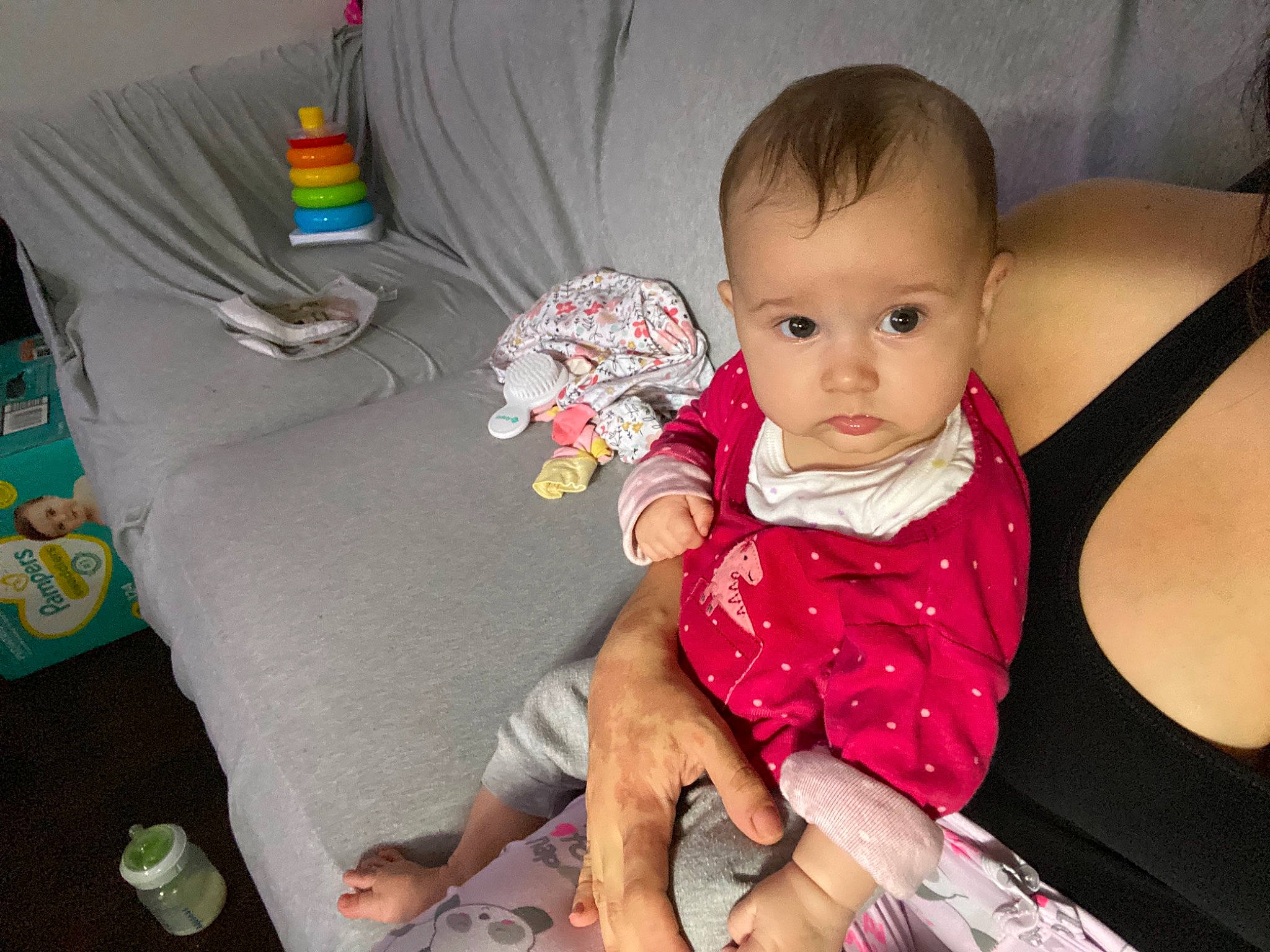 Gabriella is registered to the contest to win money with this photo: baby, baby_toddler_clothing, cheek, child, comfort, event, eye, facial_expression, fun, happy, head, human_leg, iris, mouth, nail, person, sitting, skin, thigh, thumb