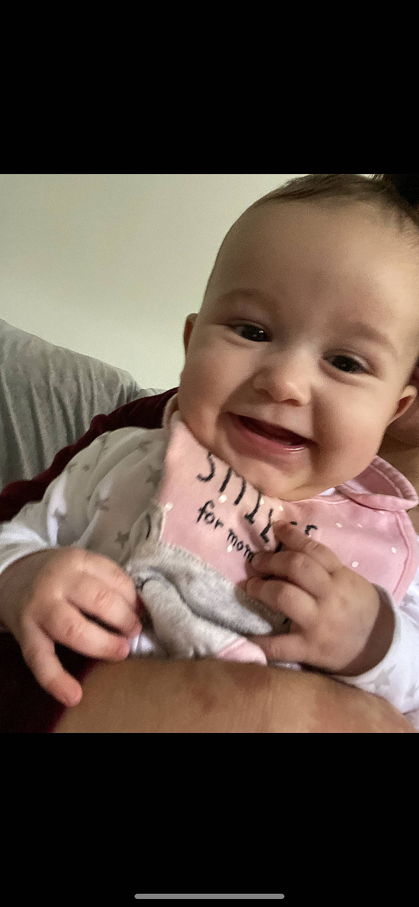 Gabriella is registered to the contest to win money with this photo: baby, baby_toddler_clothing, cheek, comfort, cool, eye, eyebrow, finger, gesture, hand, happy, iris, joy, lip, mouth, nose, person, skin, sleeve, smile