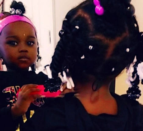 Khaya is registered to the contest to win money with this photo: artificial_hair_integrations, black_hair, costume, costume_accessory, earrings, event, eyebrow, eyelash, fashion_accessory, fashion_design, fun, fur, hair_accessory, headpiece, jewellery, magenta, pattern, person, sunglasses, toddler